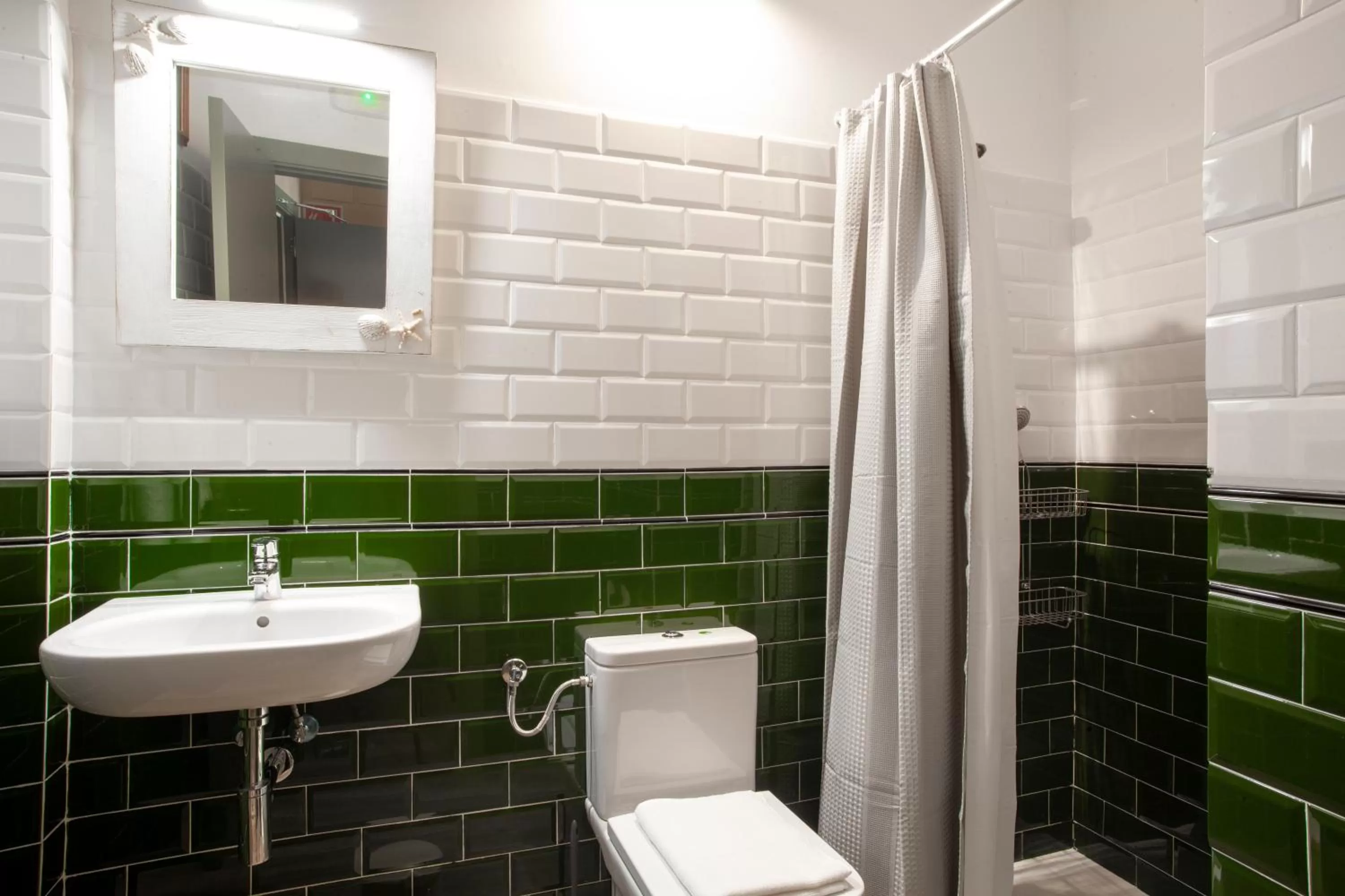 Bathroom in Priorat Aparthotel
