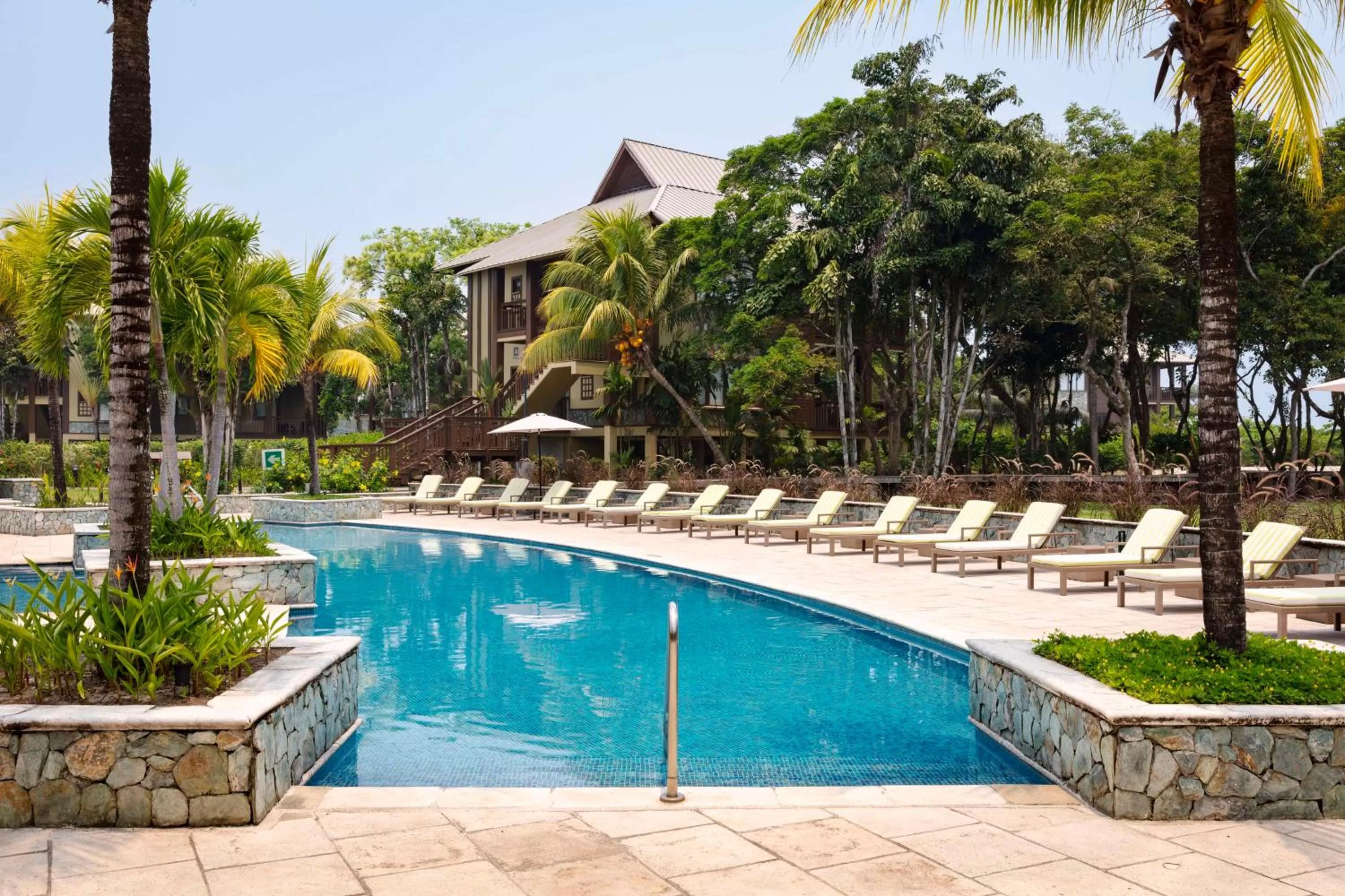 Pool view in Indura Beach & Golf Resort Curio Collection By Hilton