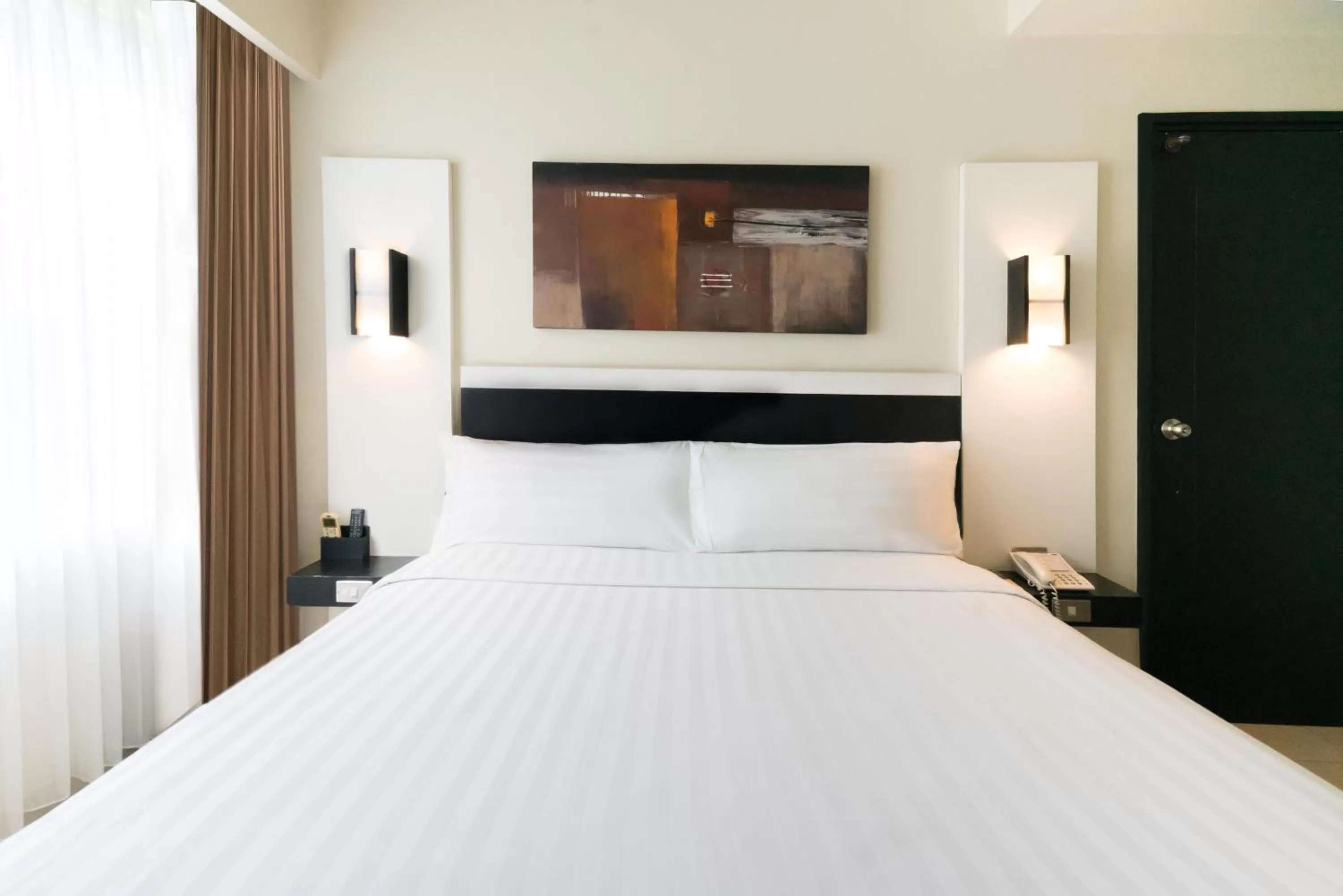 Bed in Aston Denpasar Hotel & Convention