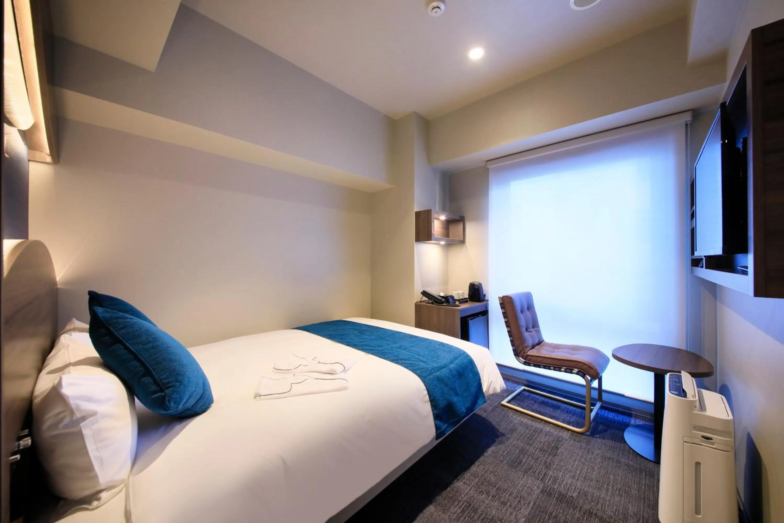 Bed in Quintessa Hotel Tokyo Ginza