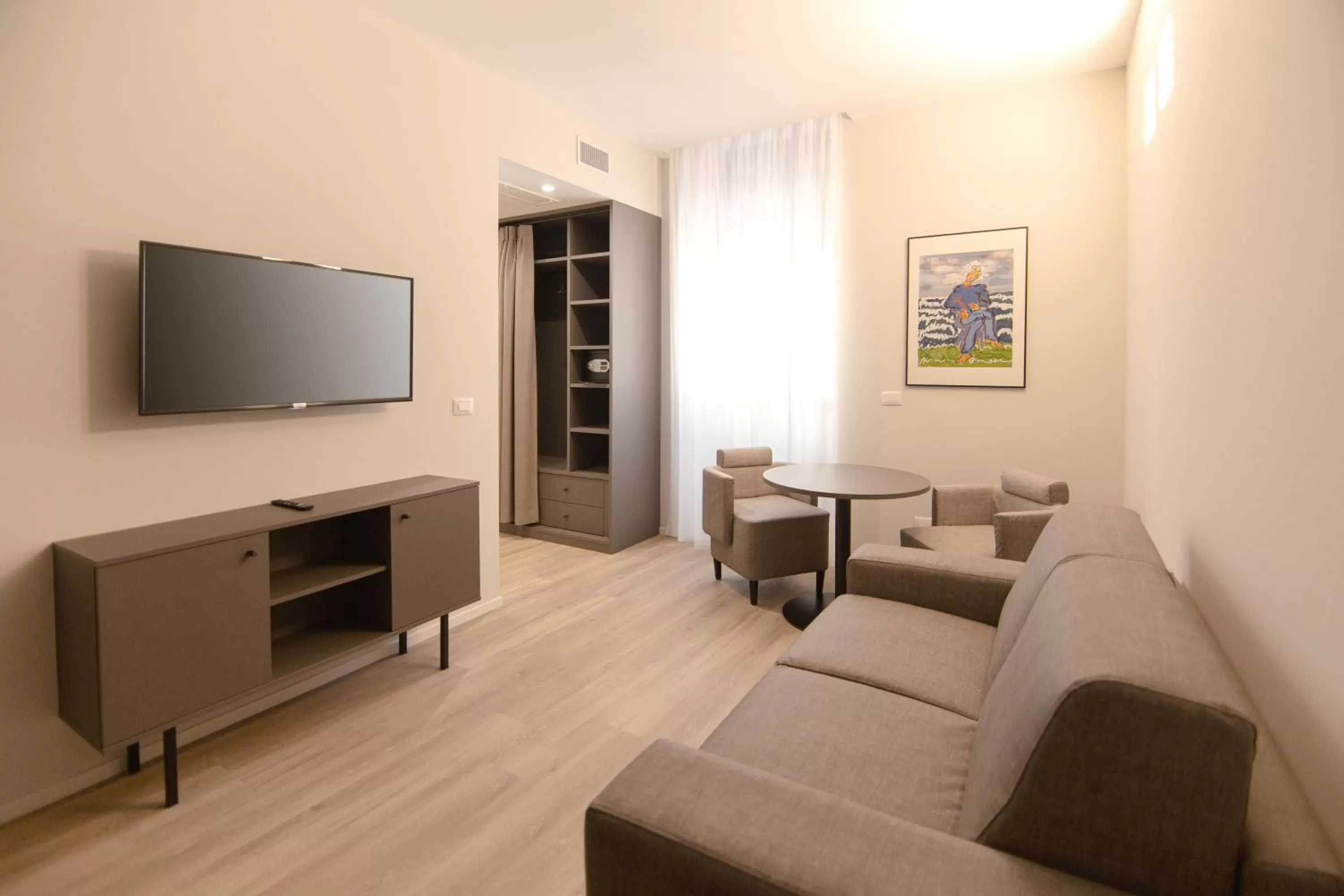 TV and multimedia in Palazzo Bellocchi - Suites & Apartments