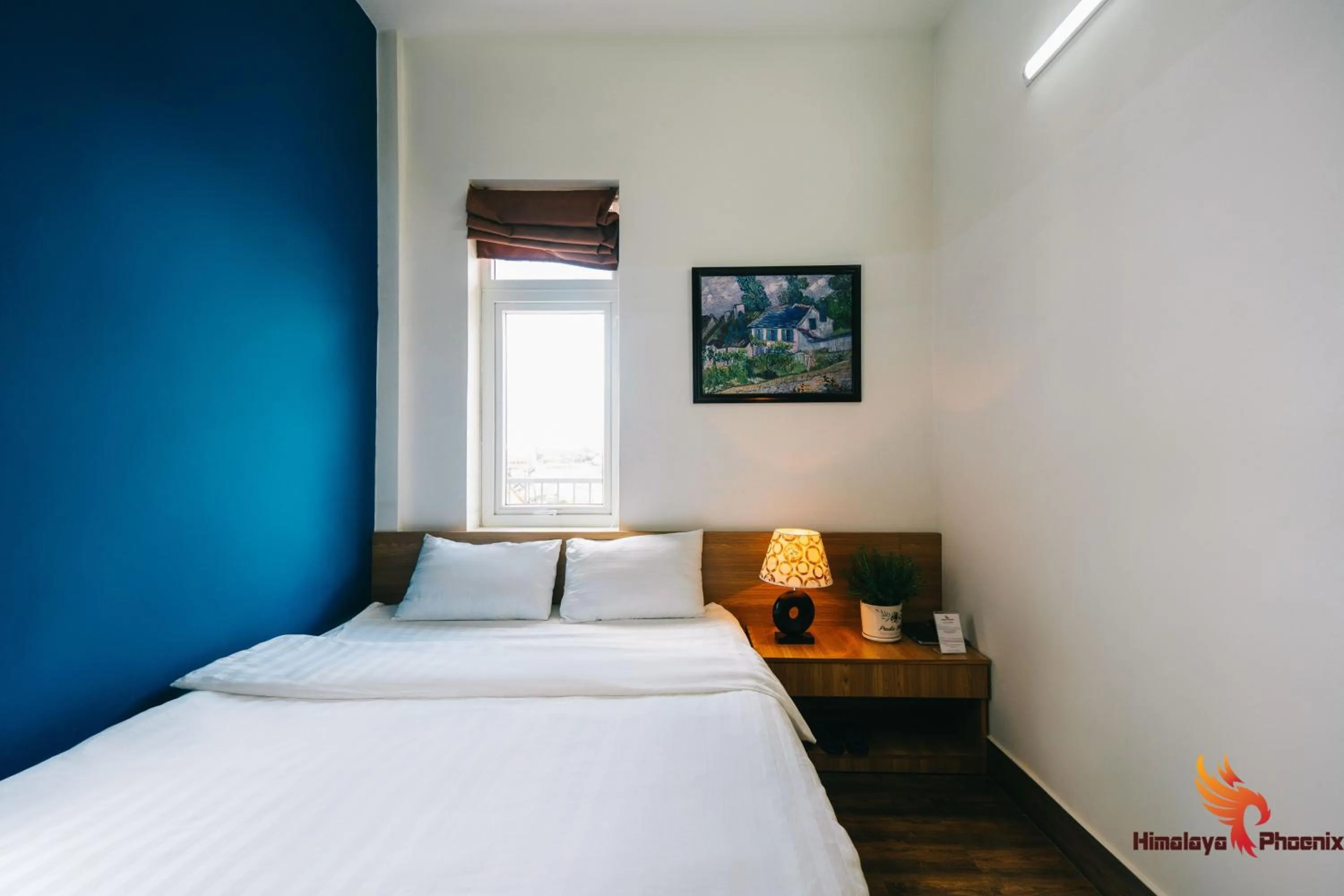 Bed in Himalaya Phoenix Hotel