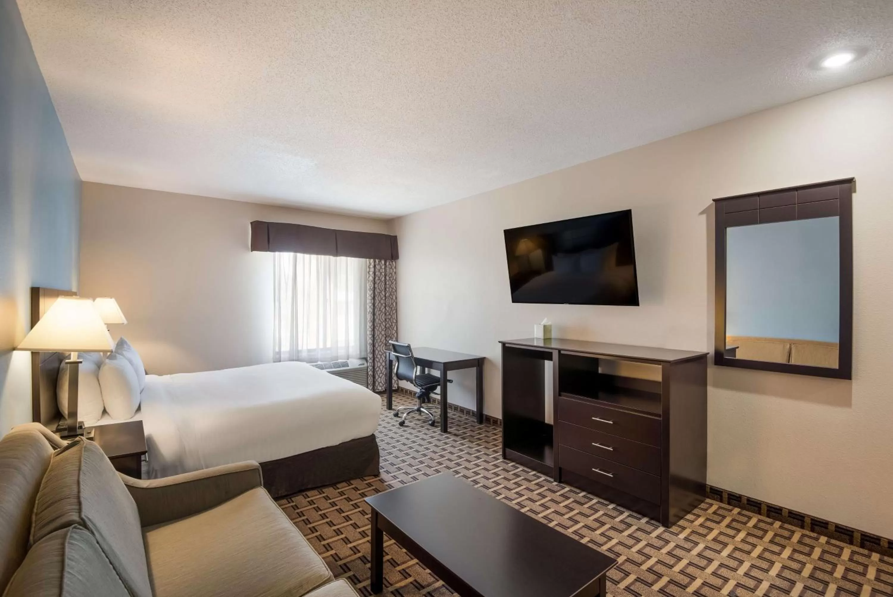Bedroom, Bed in SureStay Plus Hotel by Best Western Coralville Iowa City