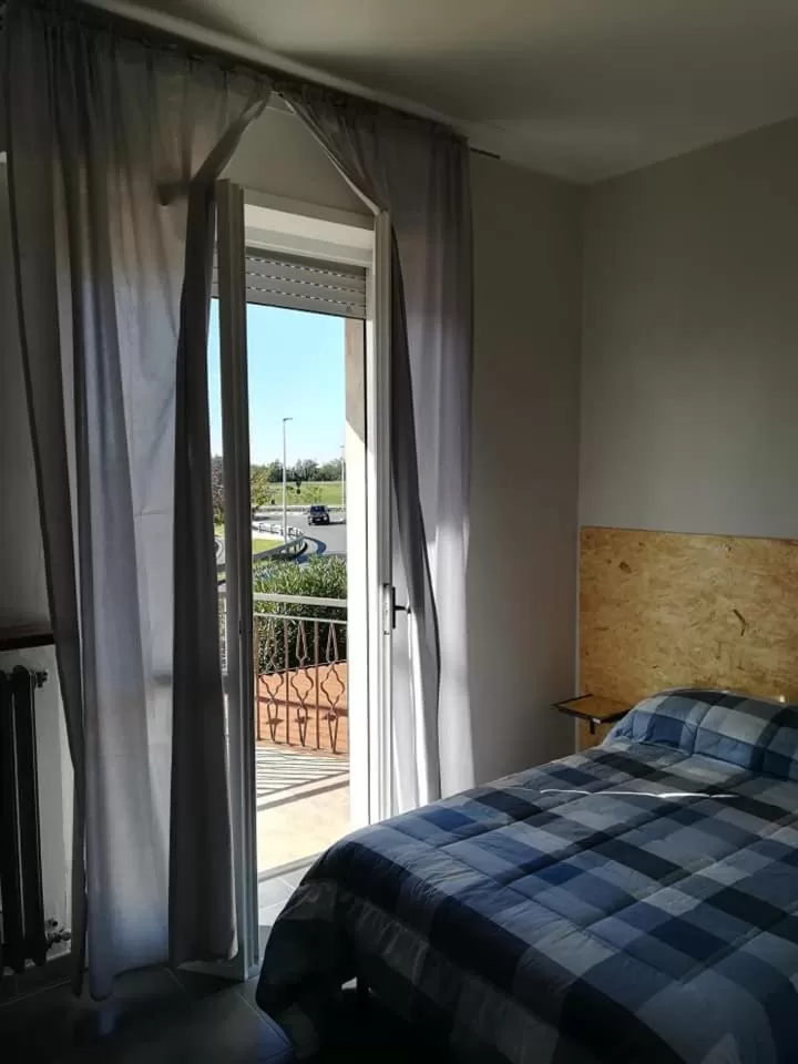 Photo of the whole room, Bed in LE MURA Foresteria