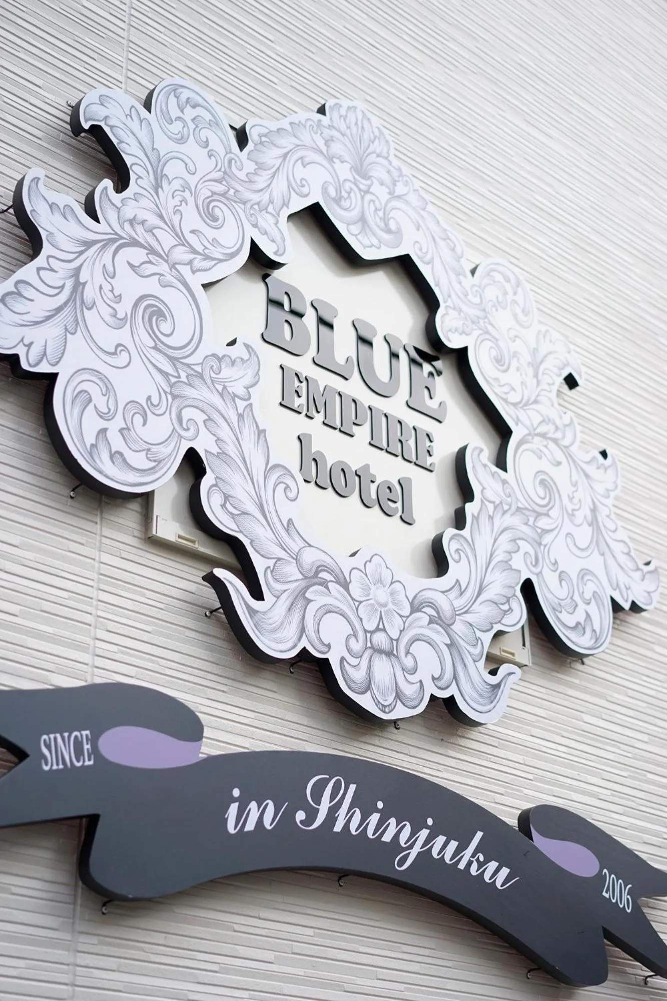 Property logo or sign in Blue Empire Hotel