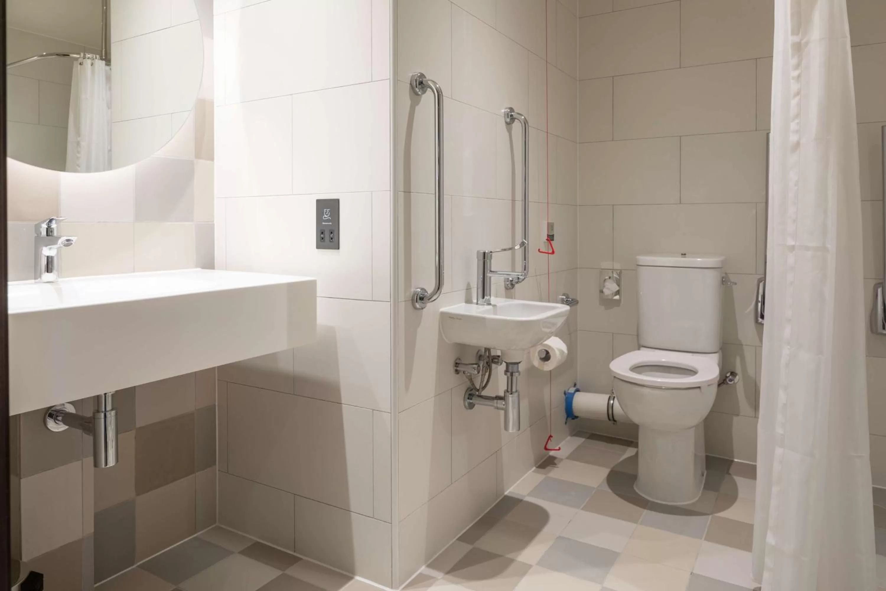 Bathroom in Hampton by Hilton Ashford International