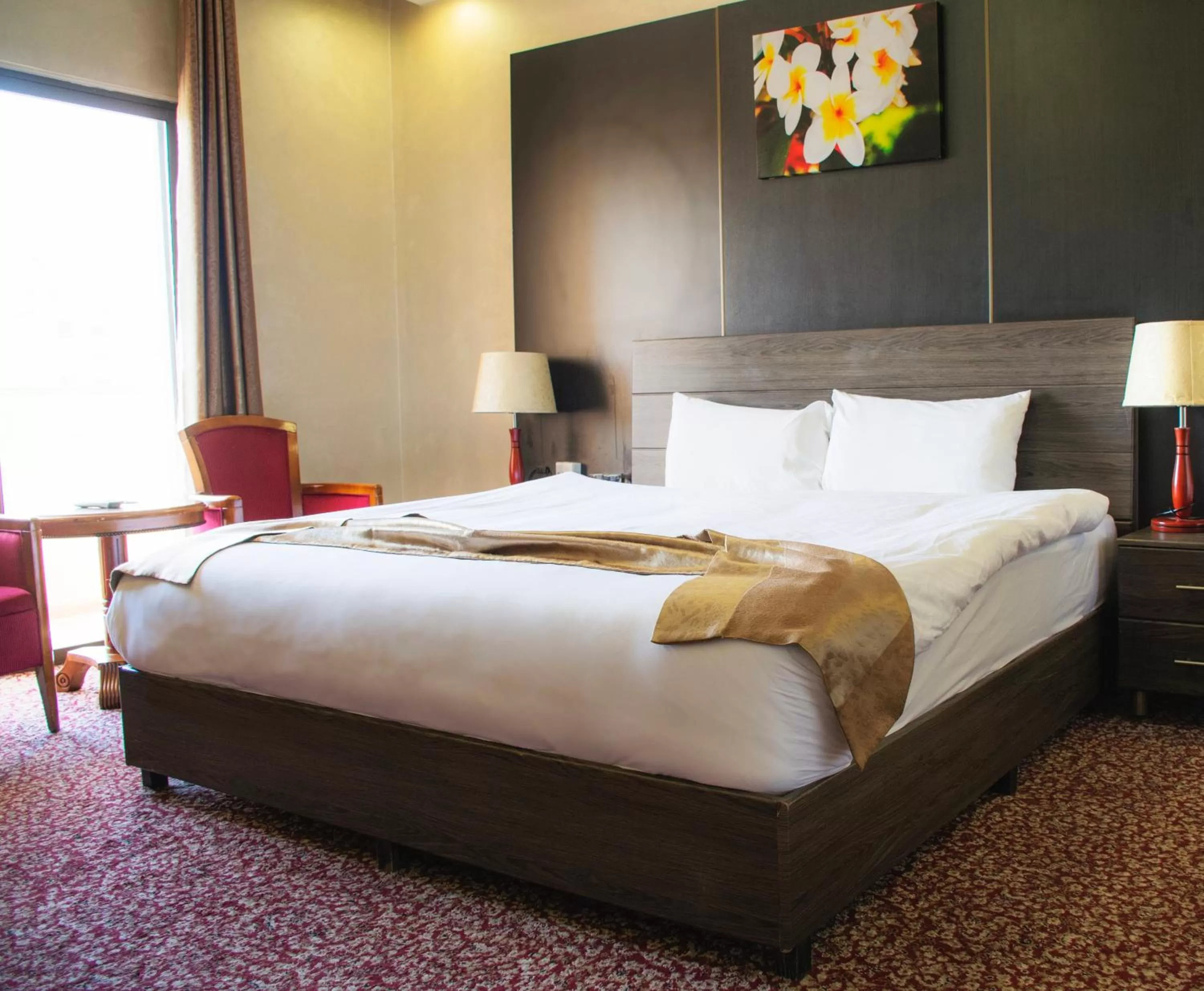 Bed in Olive Hotel Amman