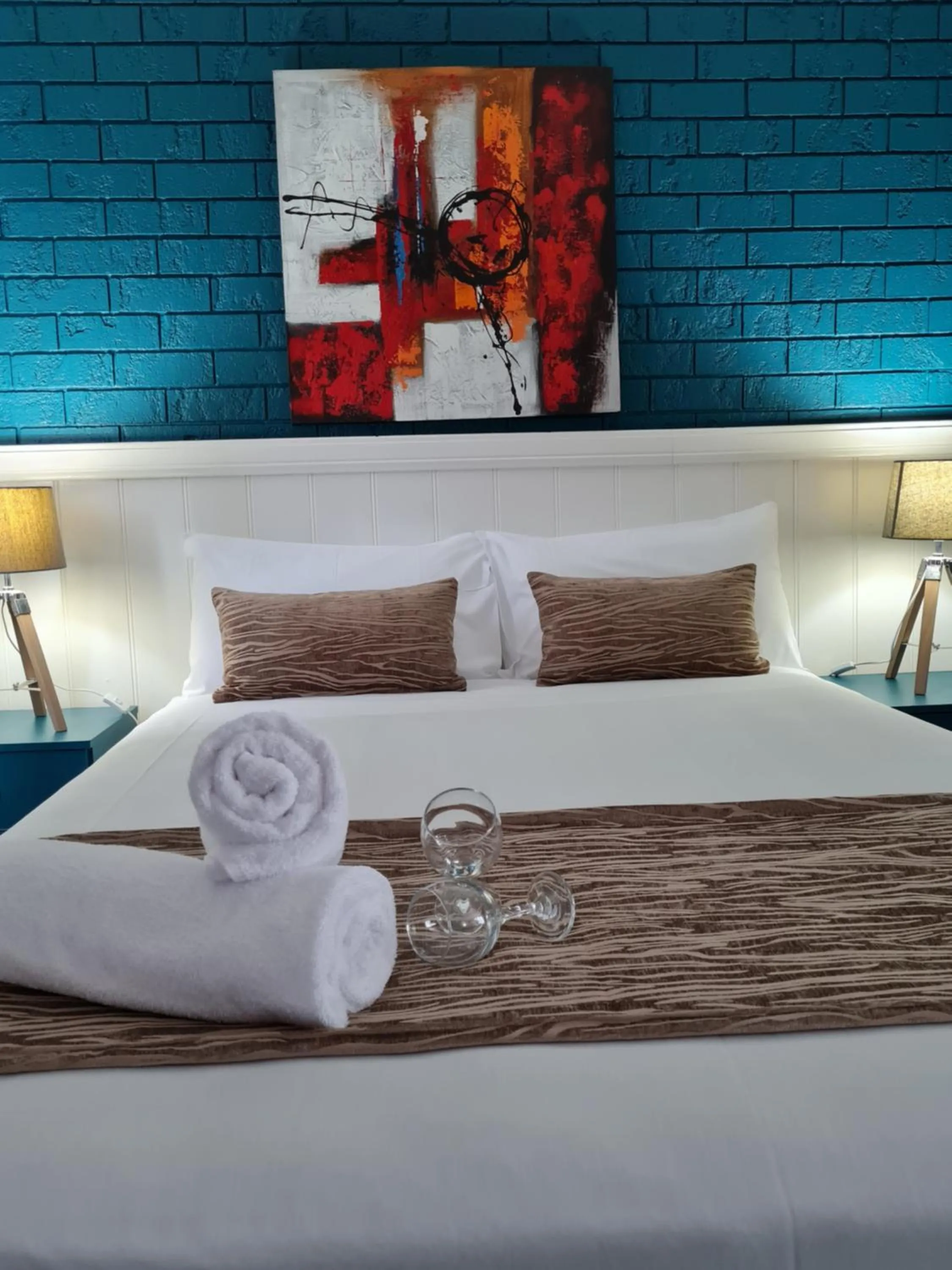 Seating area, Bed in Marco Polo Motor Inn Taree