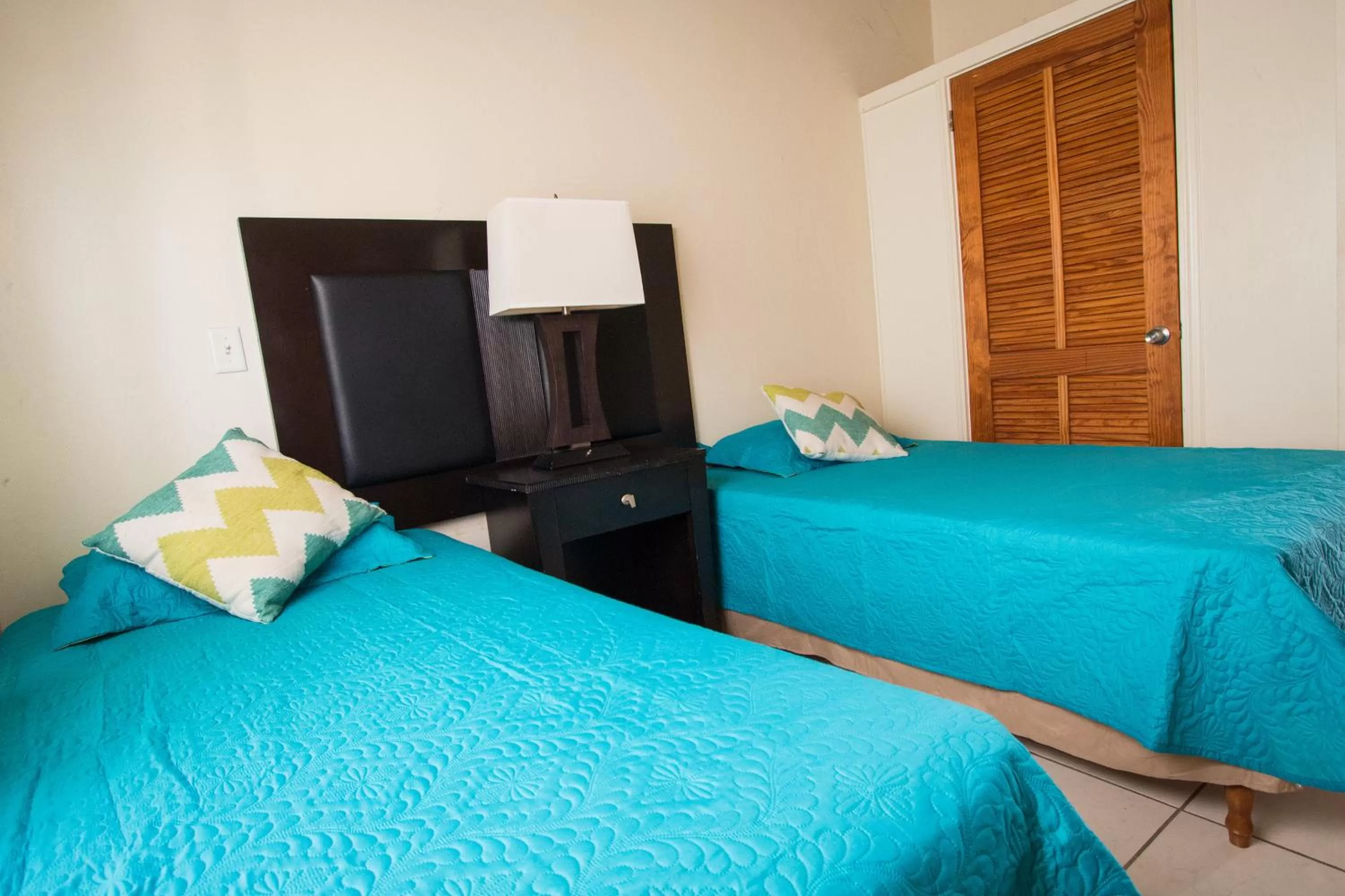 Bed in Connie's Comfort Suites