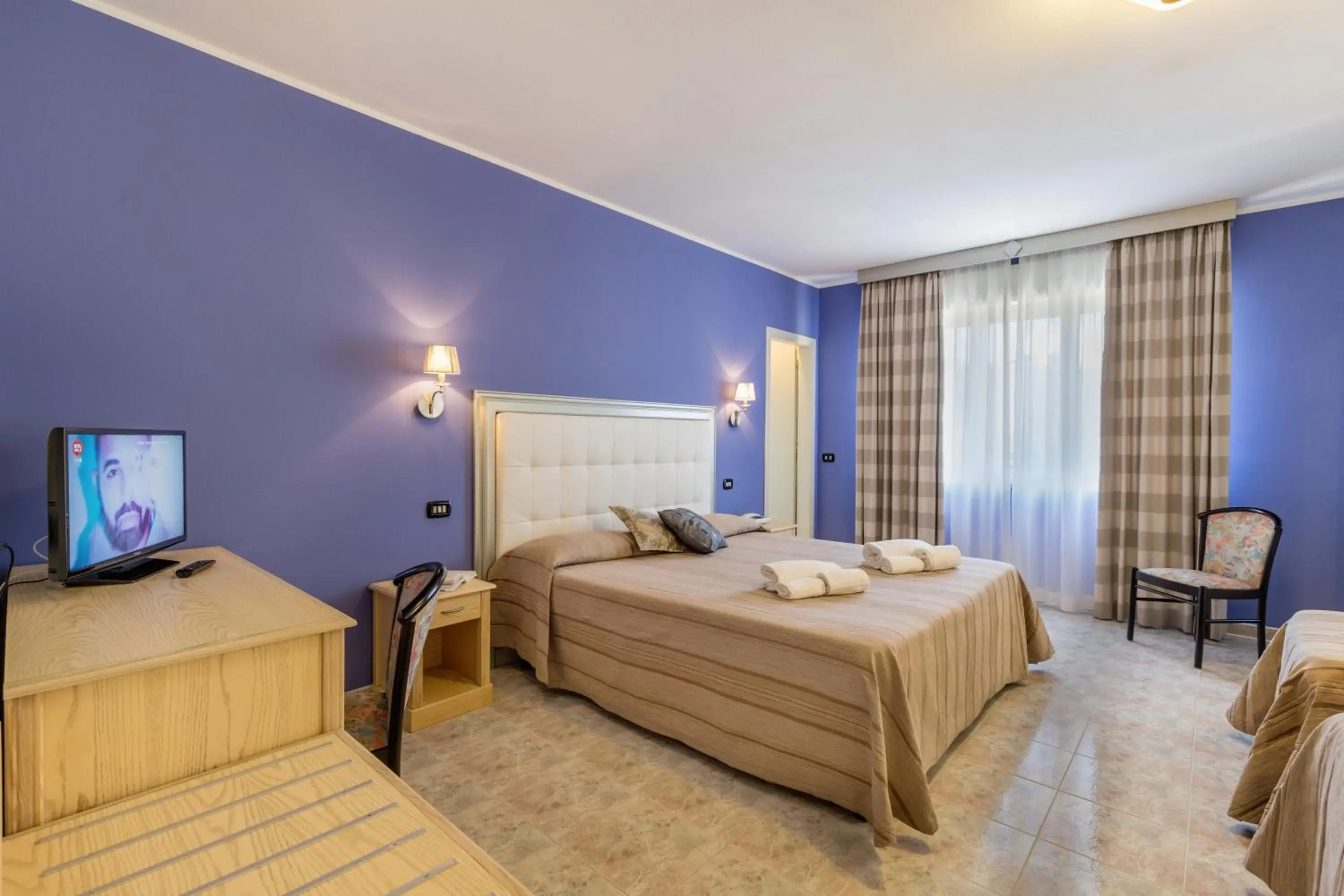 Superior Quadruple Room in Hotel Rosa dei Venti Superior Quadruple Room in Hotel Rosa dei Venti