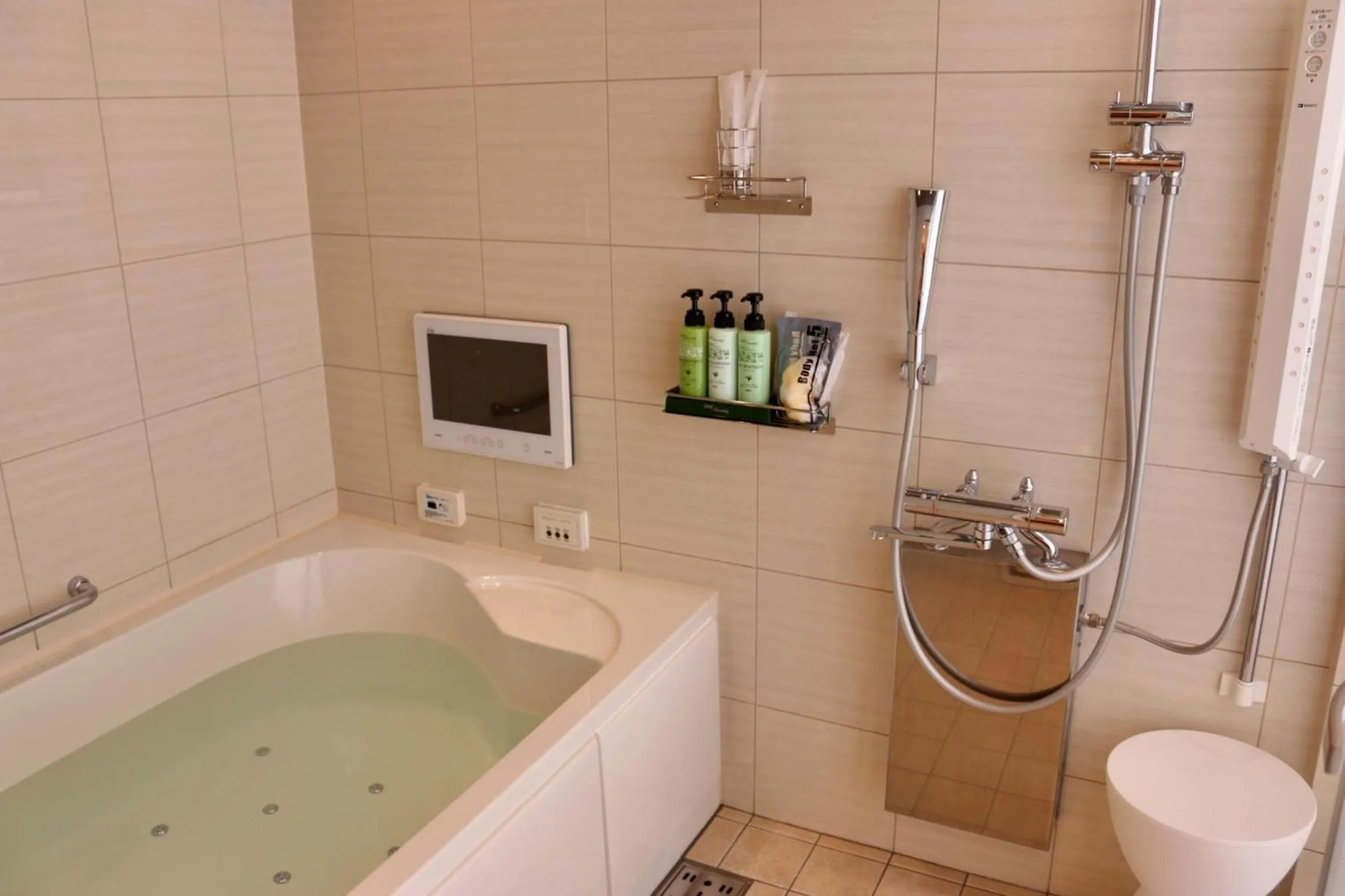 Shower in BREATH HOTEL