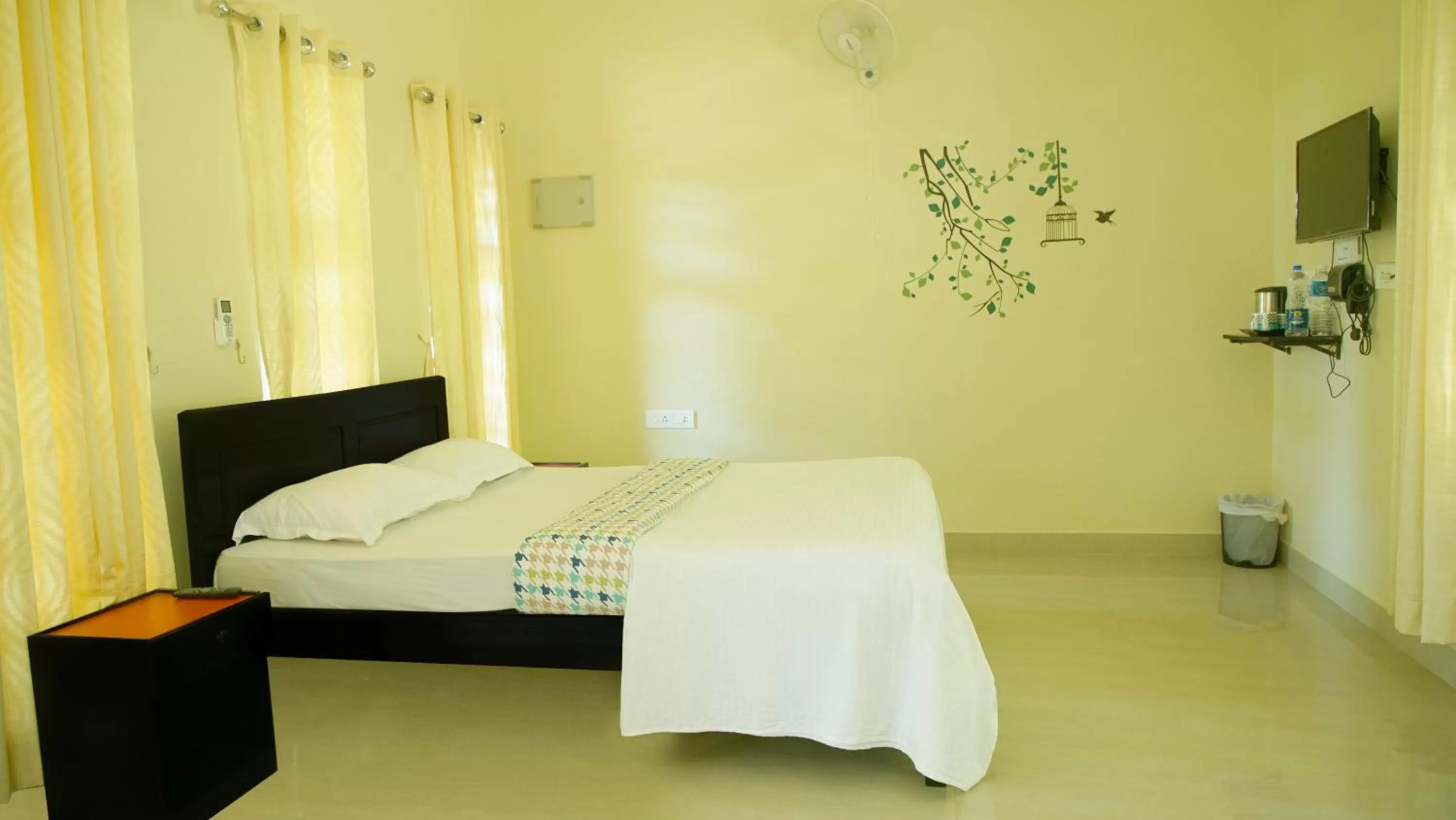 Bed in Woodrose Resort