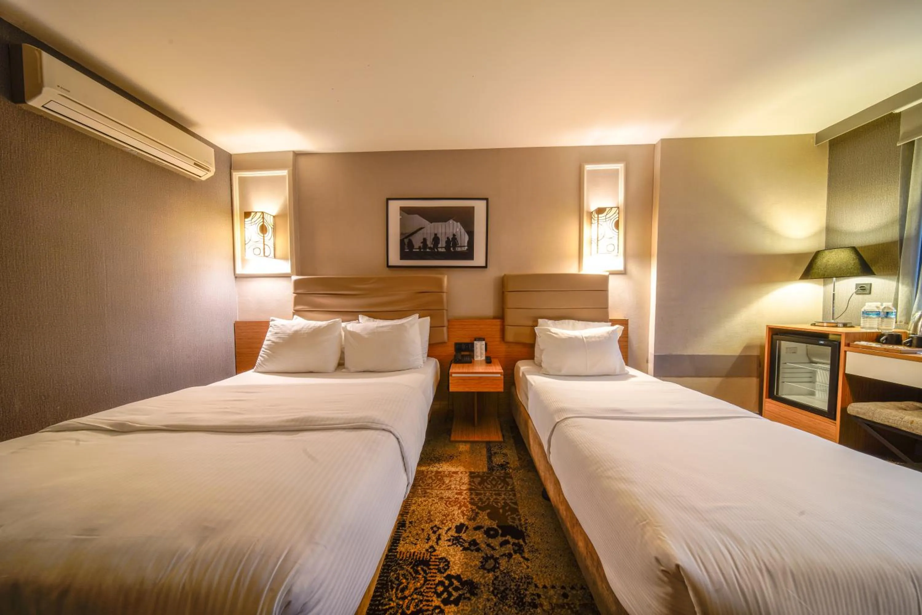 Bed in All Seasons Hotel