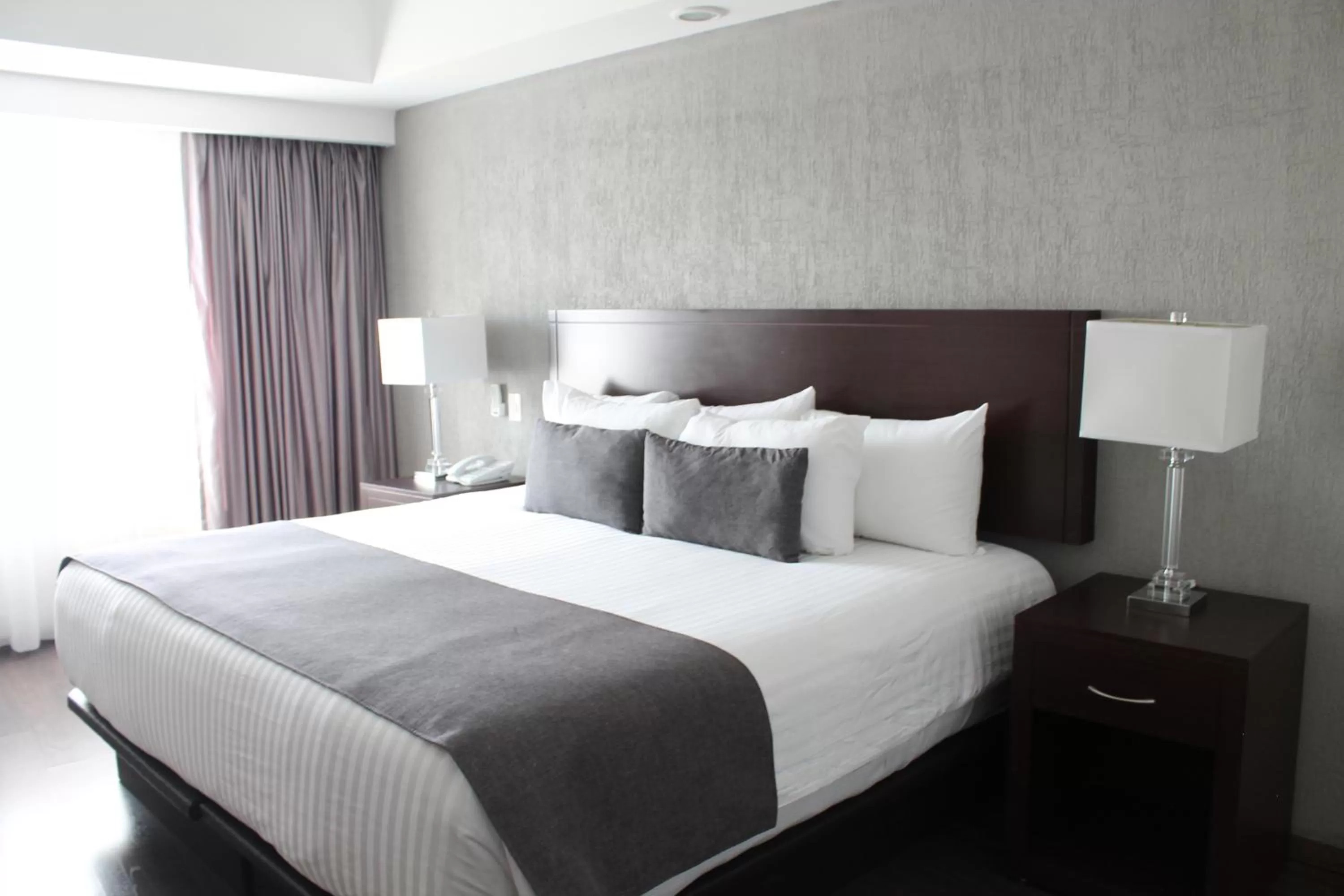 Photo of the whole room, Bed in Ejecutivo Express Guadalajara Providencia - Av México