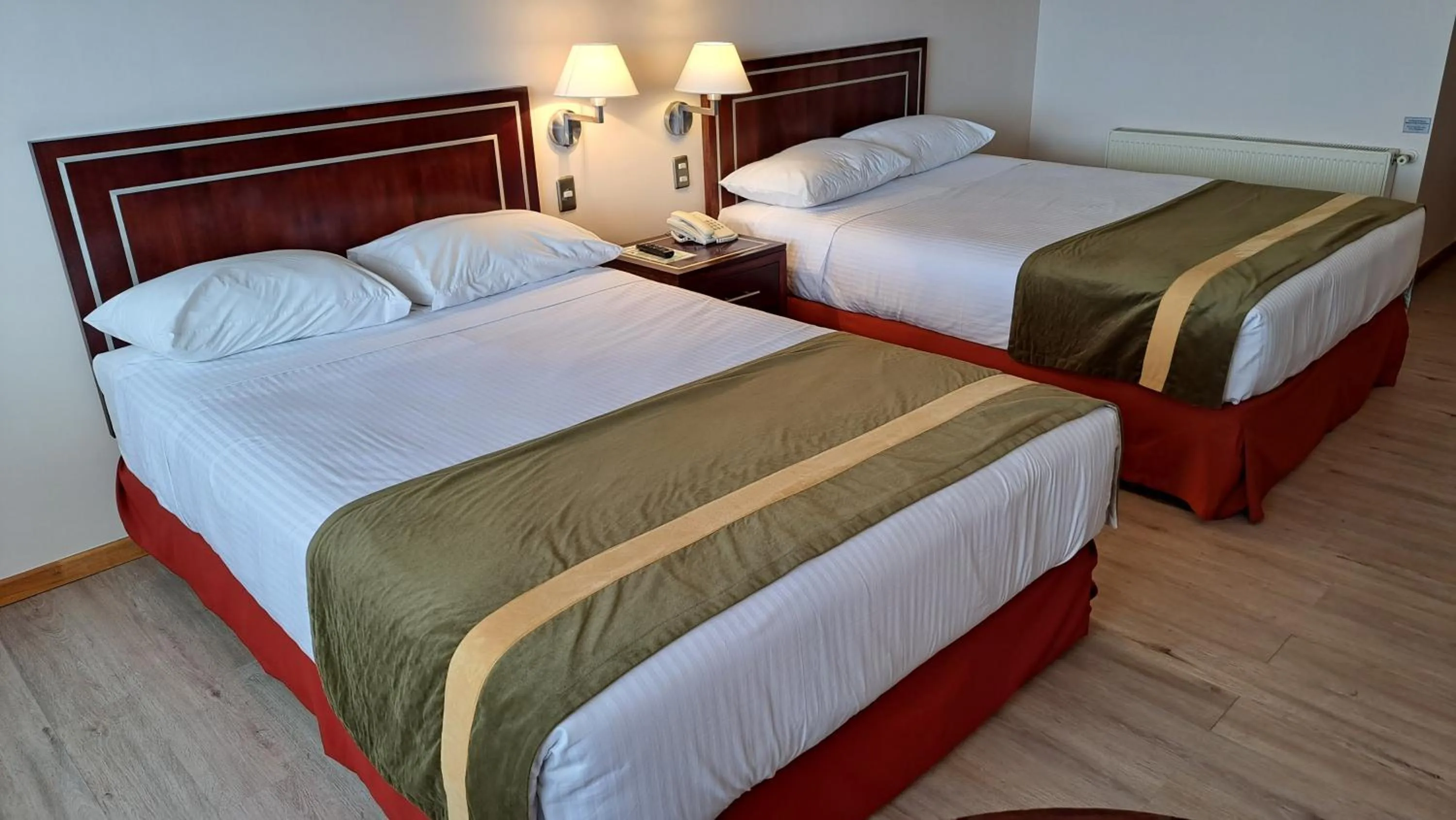 Bed in Hotel Diego de Almagro Punta Arenas