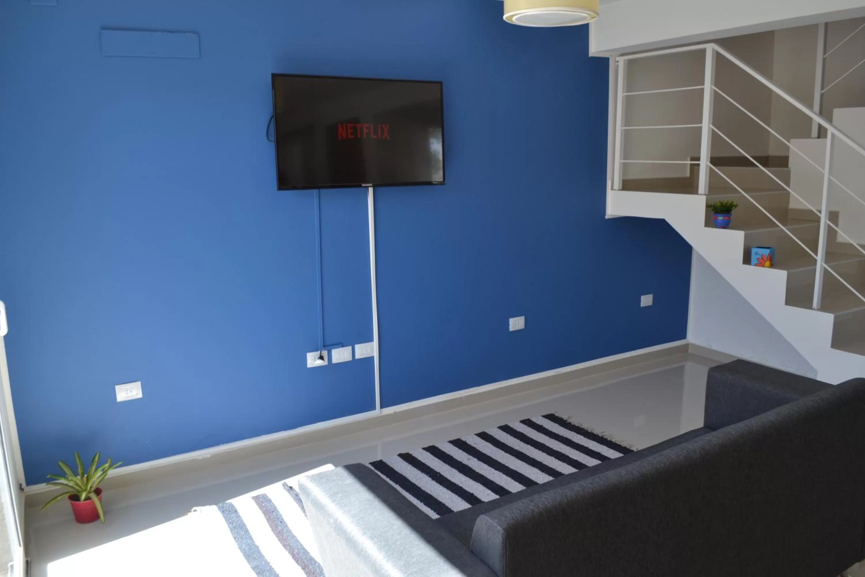 TV/Entertainment Center in Apart Porto del Sol by CPH