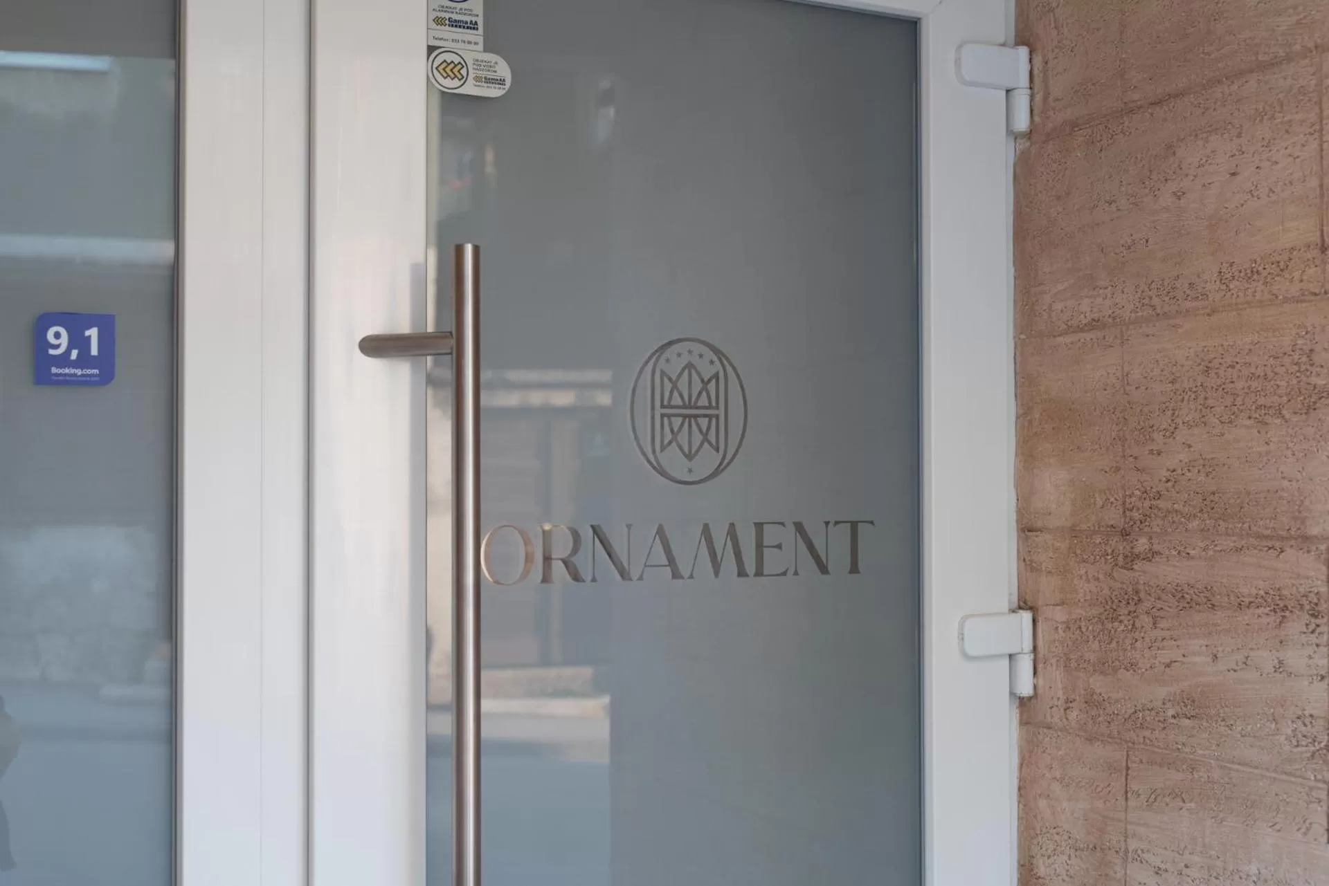 Text overlay in Ornament Hotel and Apartments