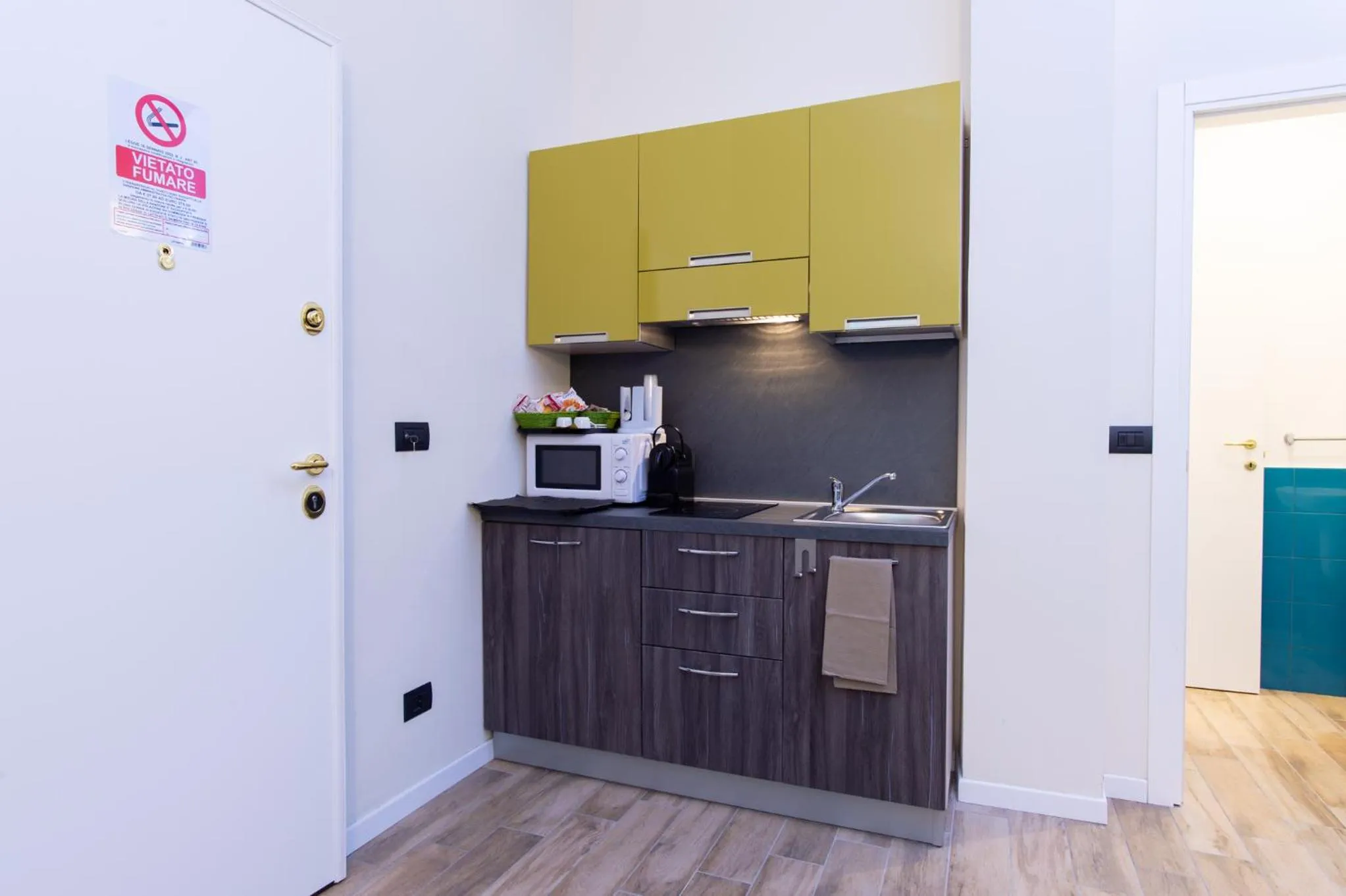 Kitchen or kitchenette in Aparthotel Porta Nuova