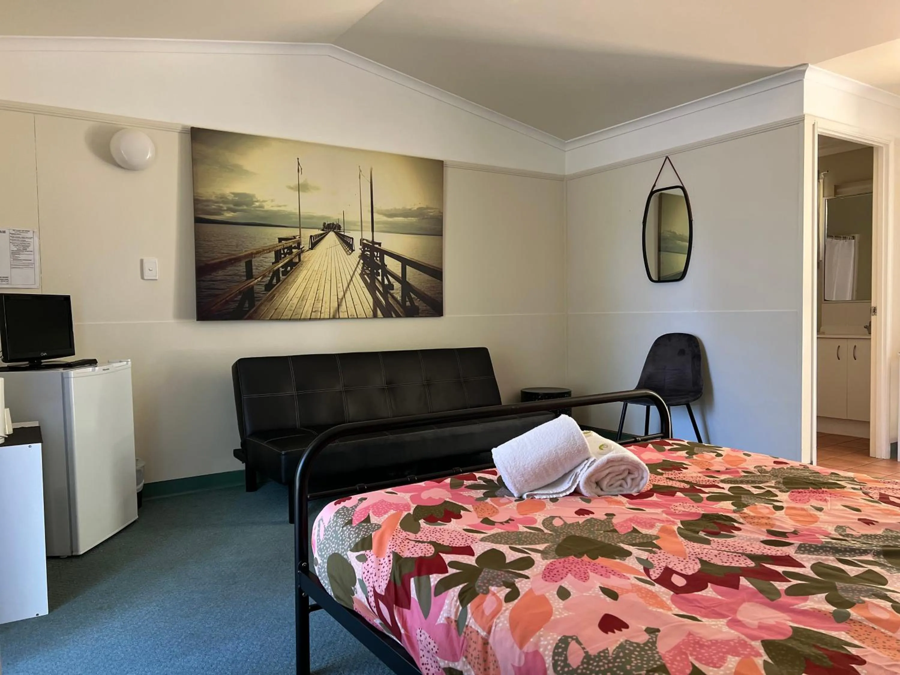 Photo of the whole room, Bed in Colonial Village Resort