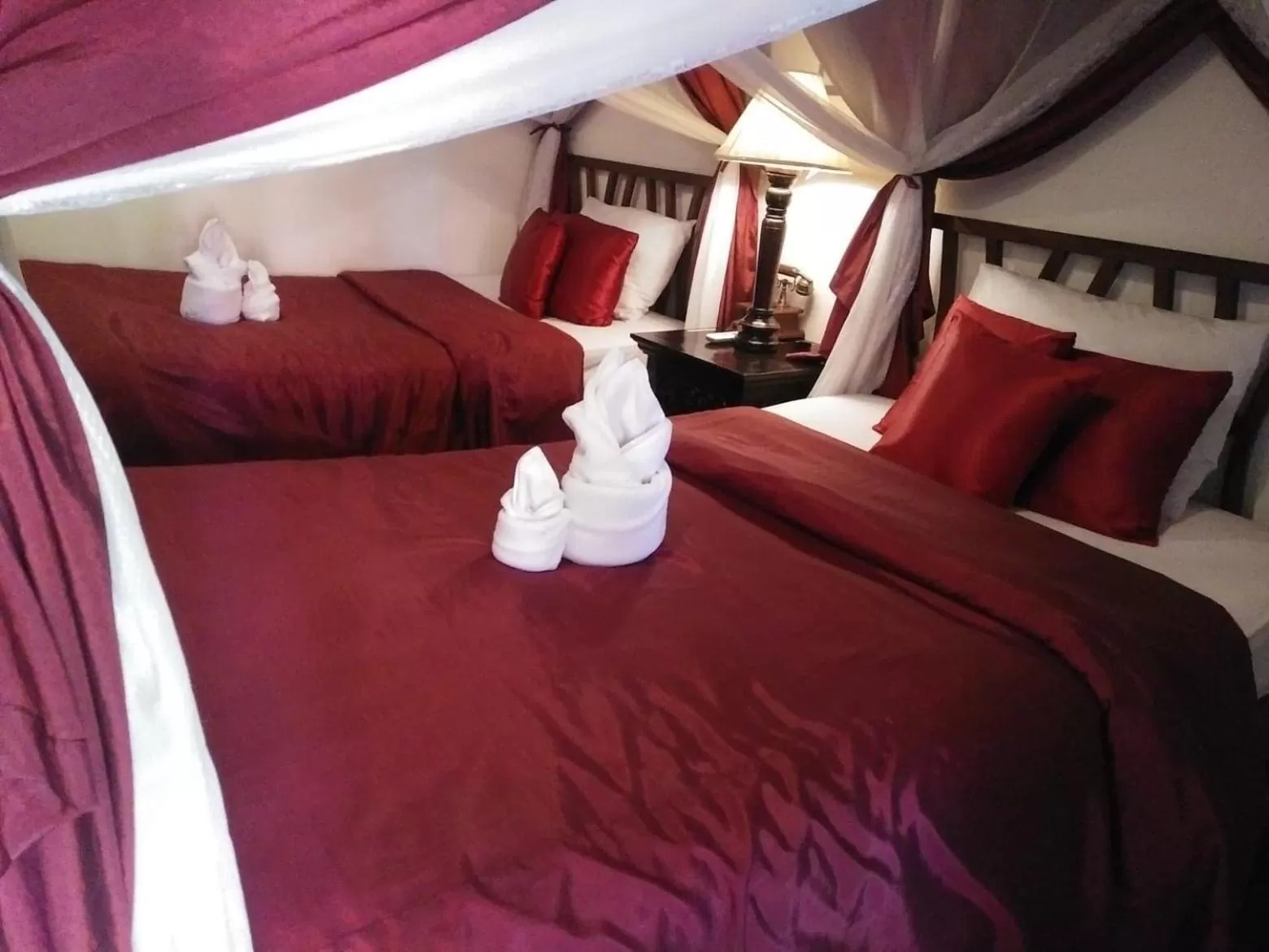 Bed in Tri Yaan Na Ros Colonial House