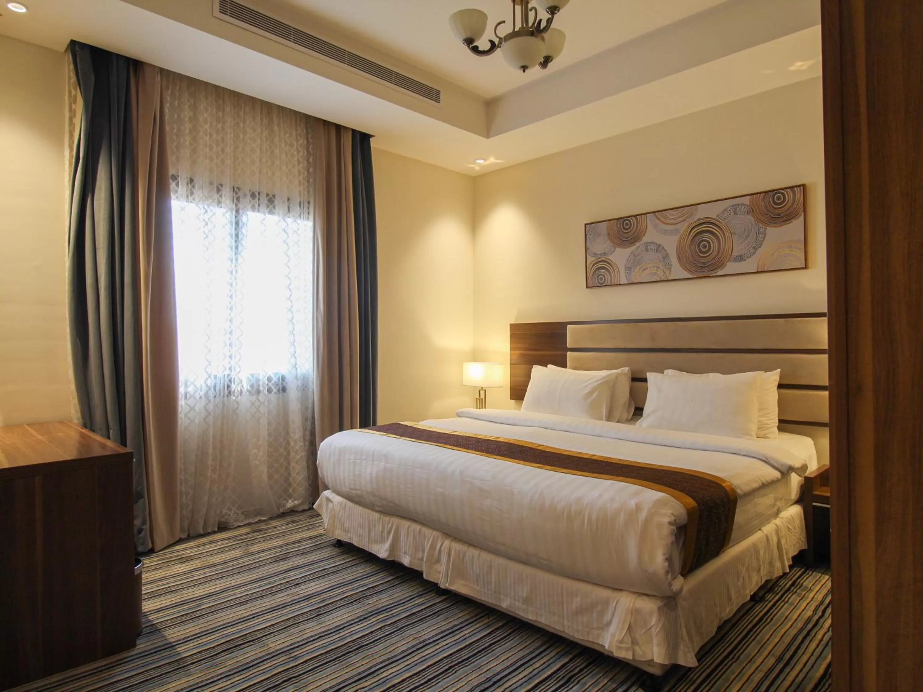 Bed in Friesian Hotel Suites