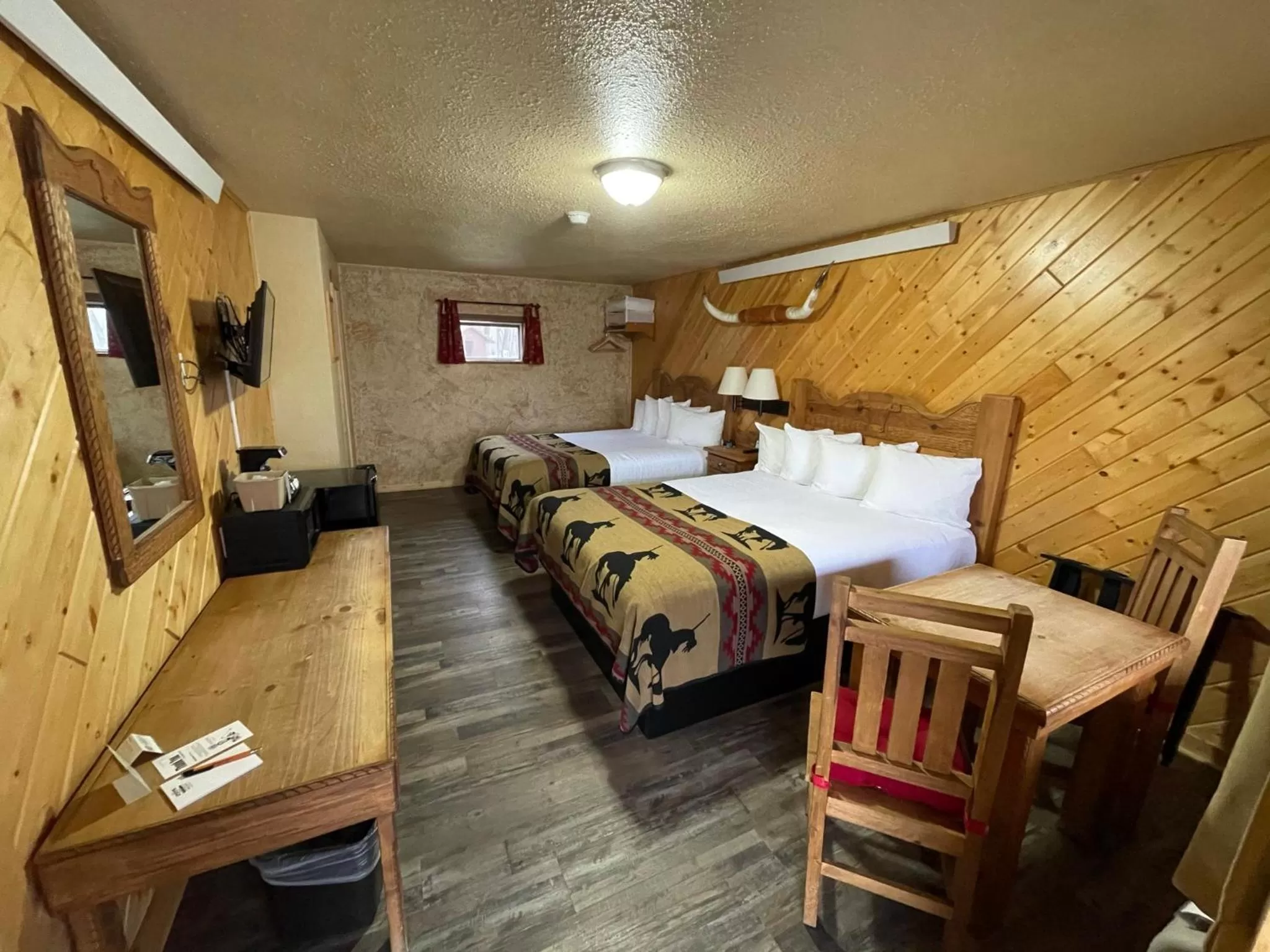 Bed in The Longhorn Ranch Resort Lodge & RV Park