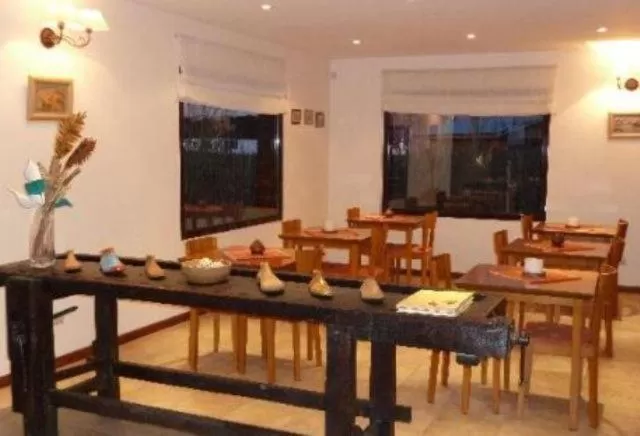 Lounge or bar in Hosteria Roblesur