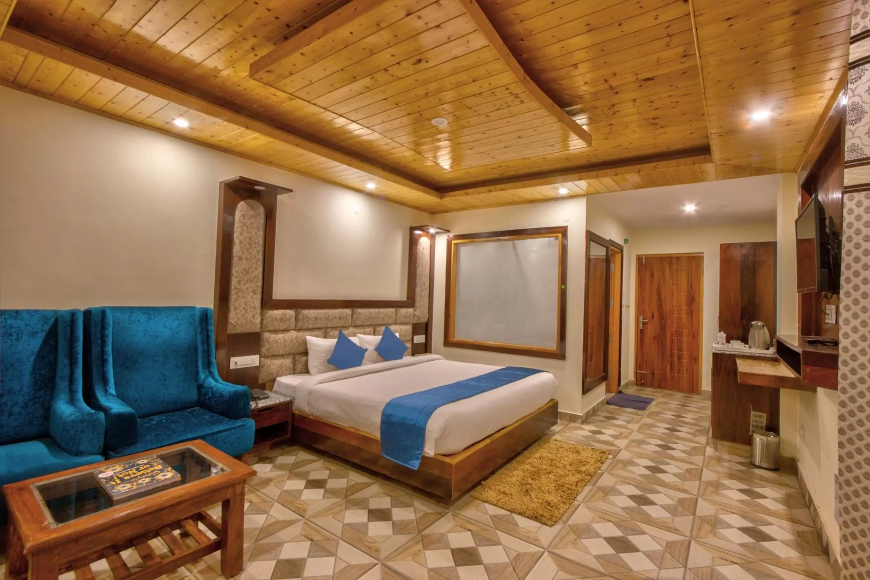 Photo of the whole room, Bed in Snow City's Montana Blues Resort Manali - Heated & Air-Cooled Stay