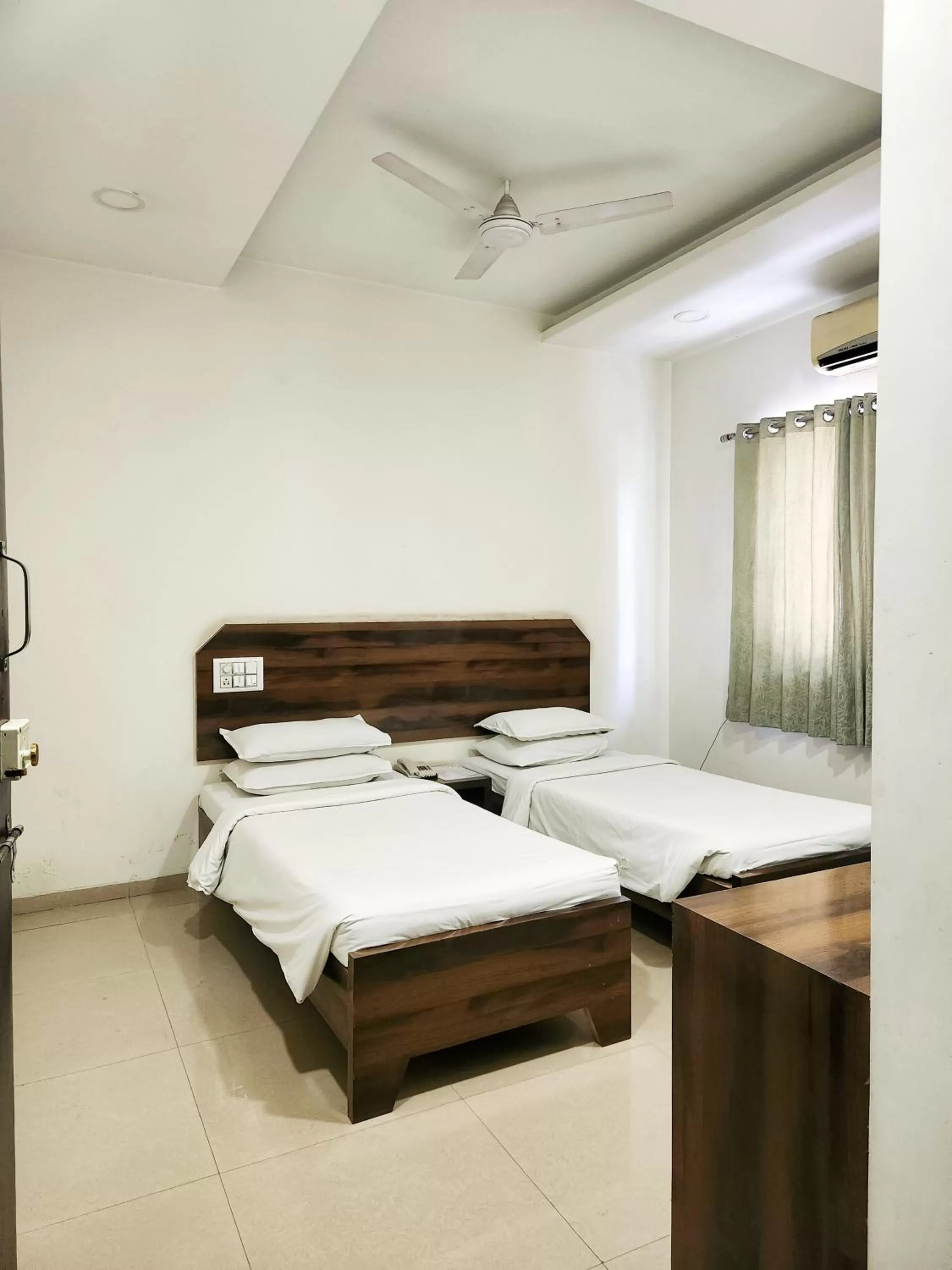 Bed in Hotel Rajwada Aurangabad