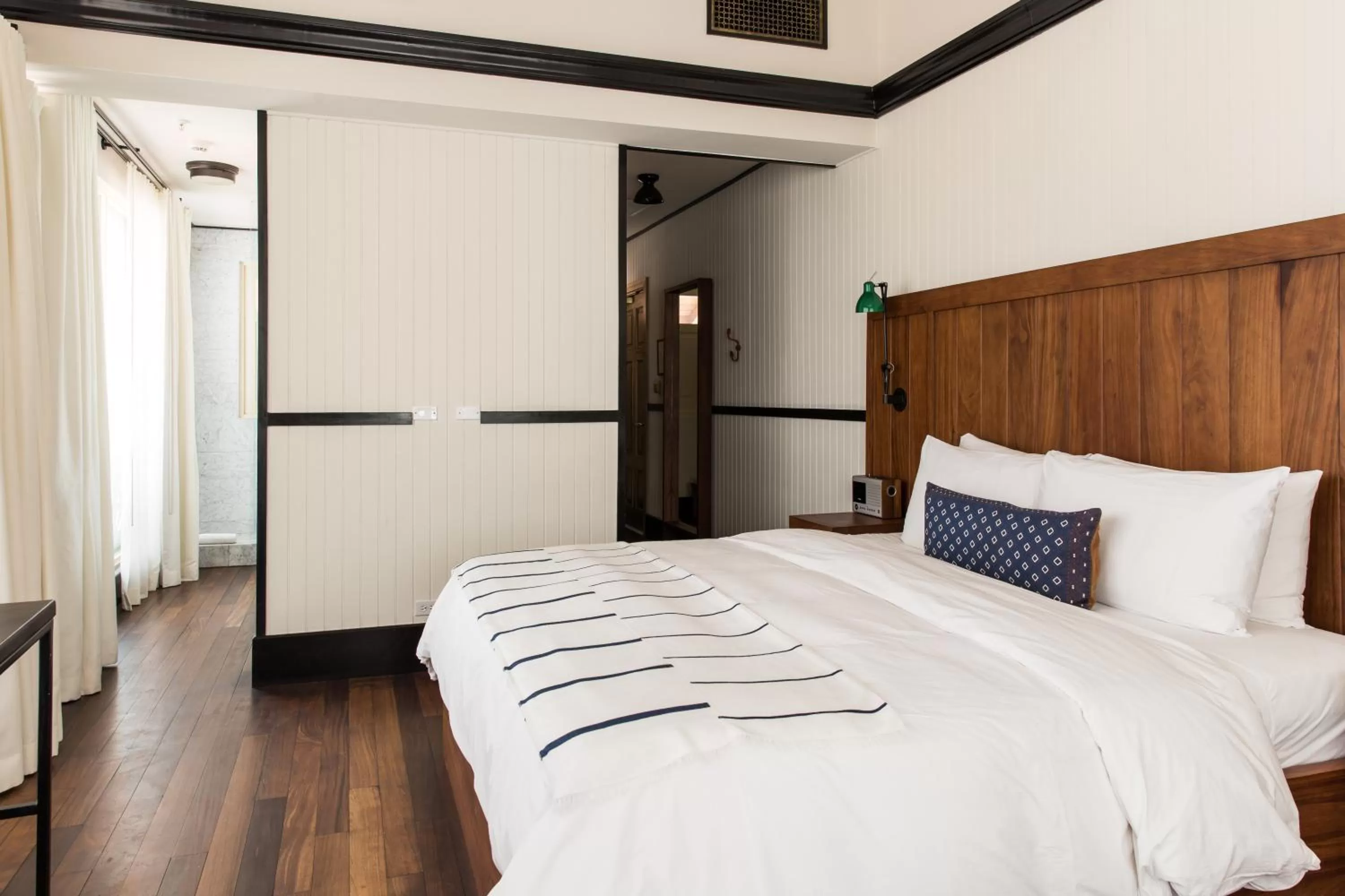 Bed in American Trade Hotel