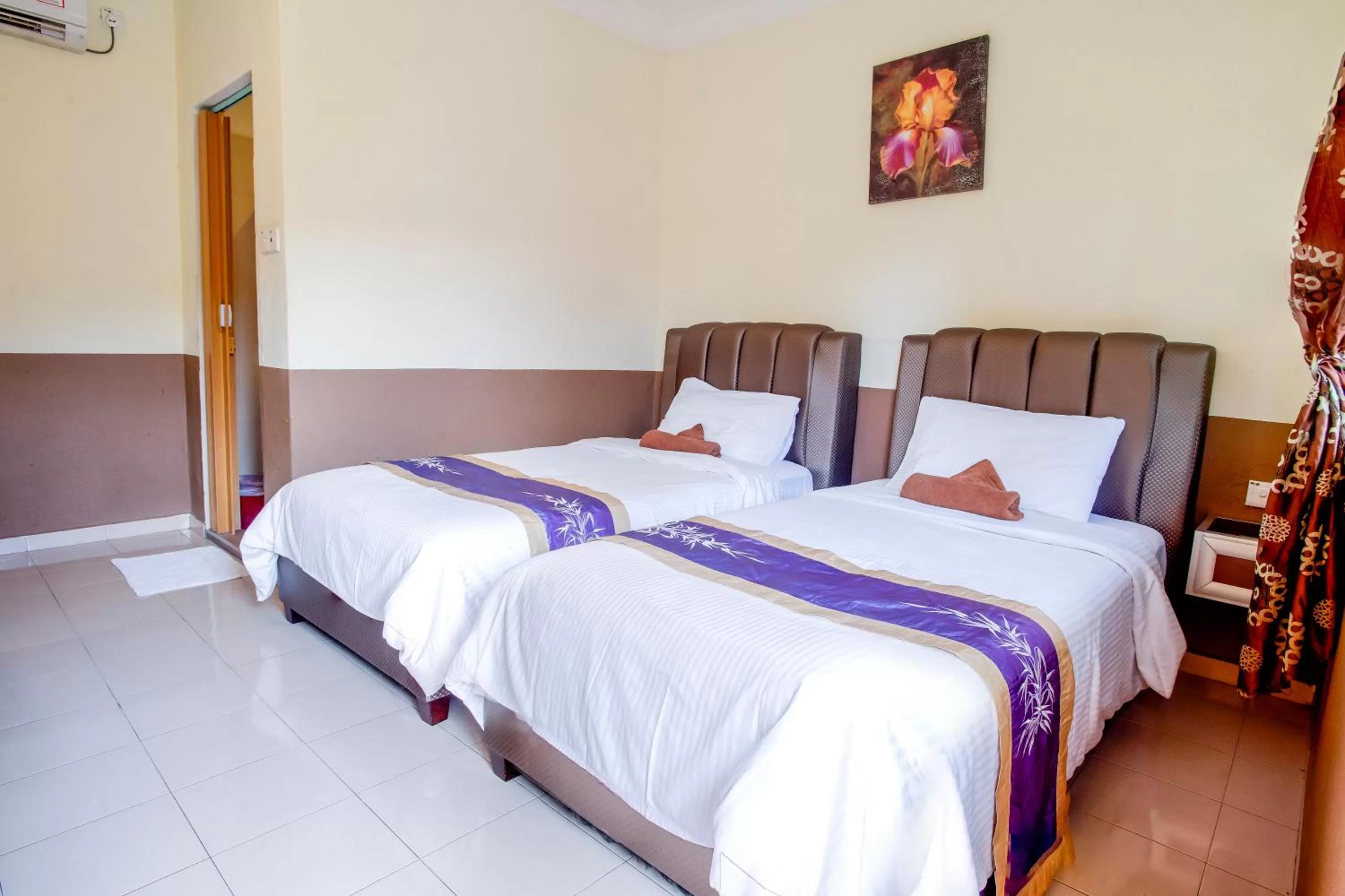 Bed in NR Langkawi Motel