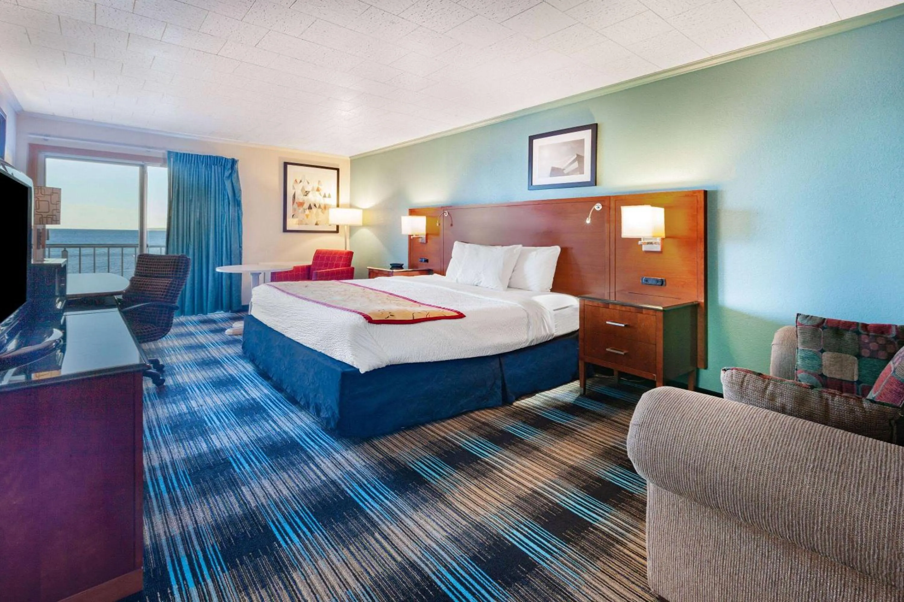 Bed in Days Inn & Suites by Wyndham St. Ignace Lakefront