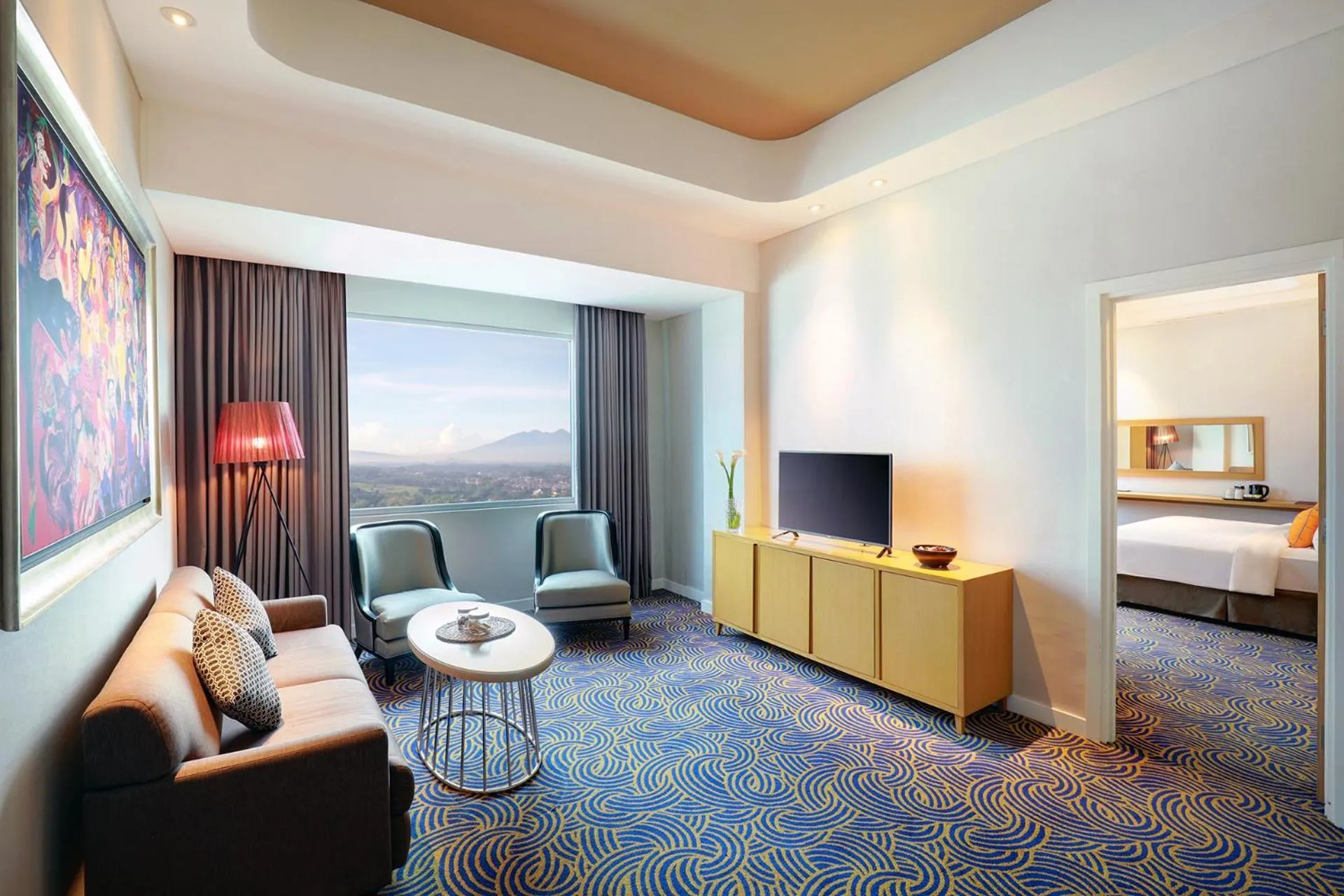 Communal lounge/ TV room, Bed in Hotel Ciputra Cibubur managed by Swiss-Belhotel International