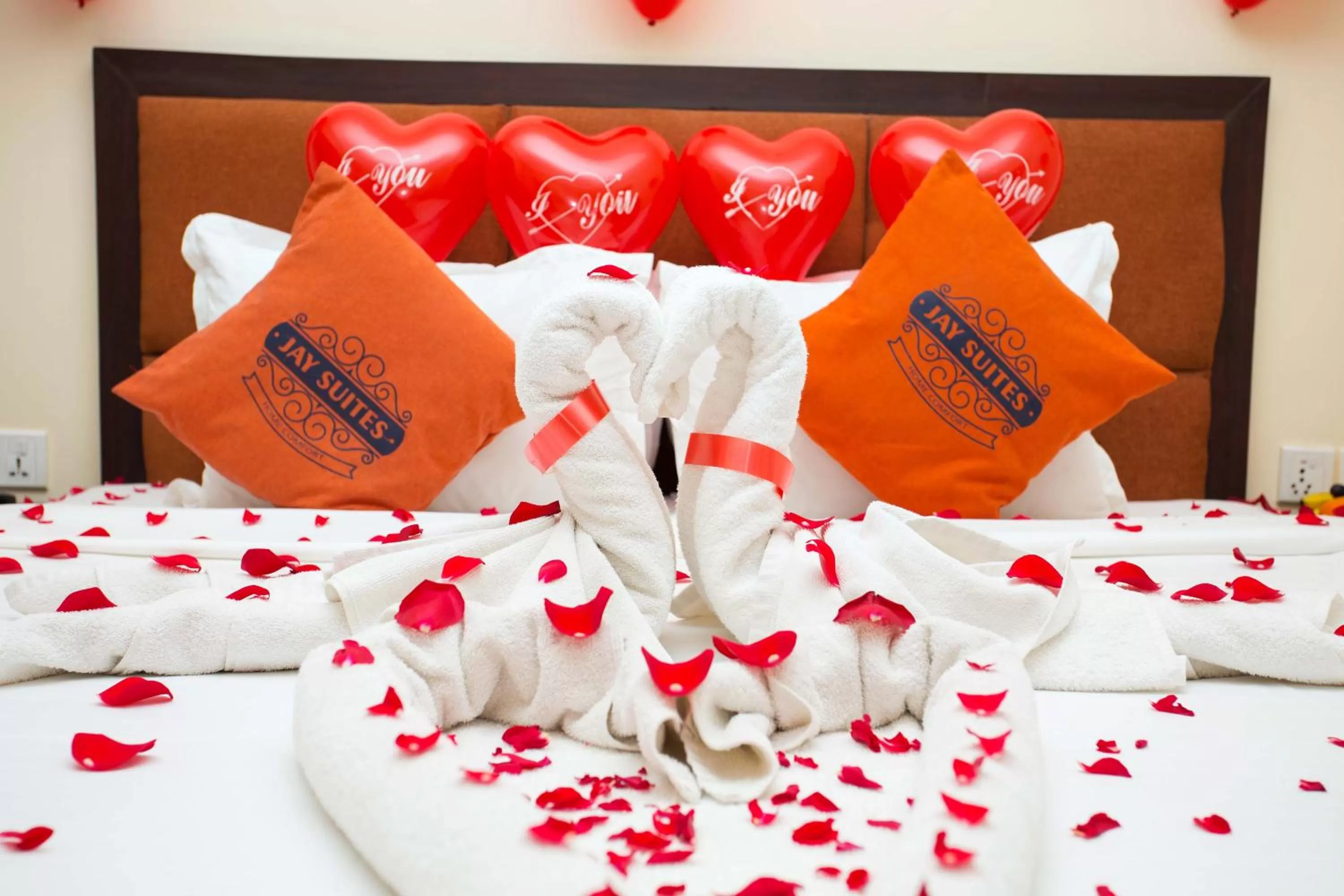 Bed in Hotel Jay Suites