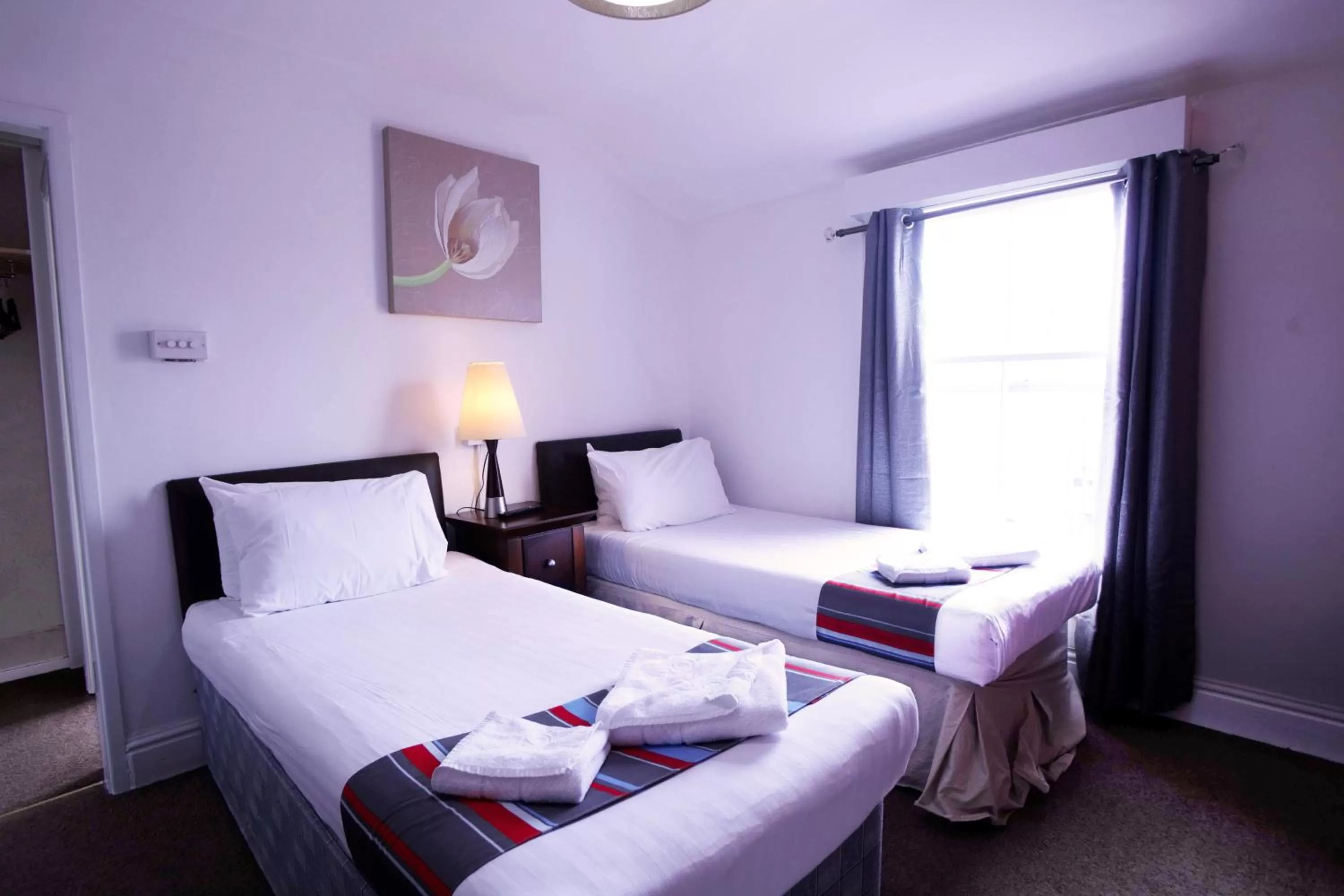 Bed in The Broadway Hotel