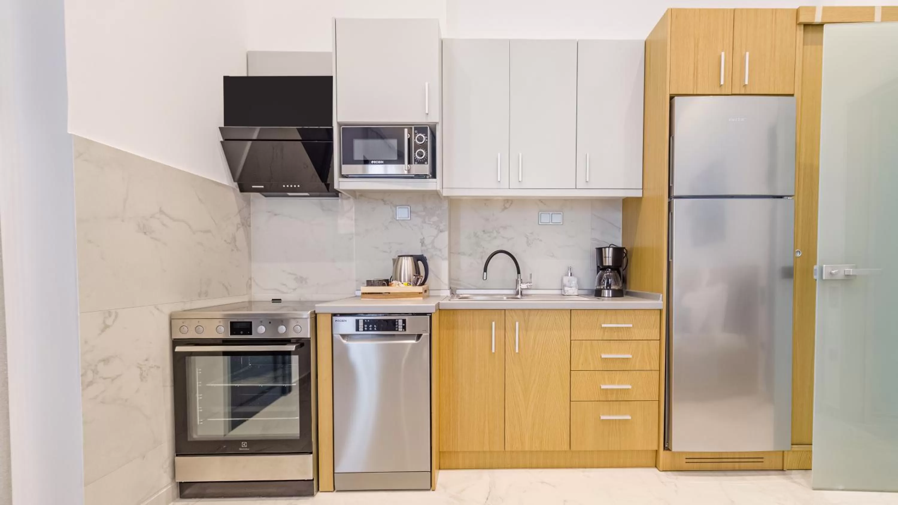 Kitchen or kitchenette in Kima Premium Apartments