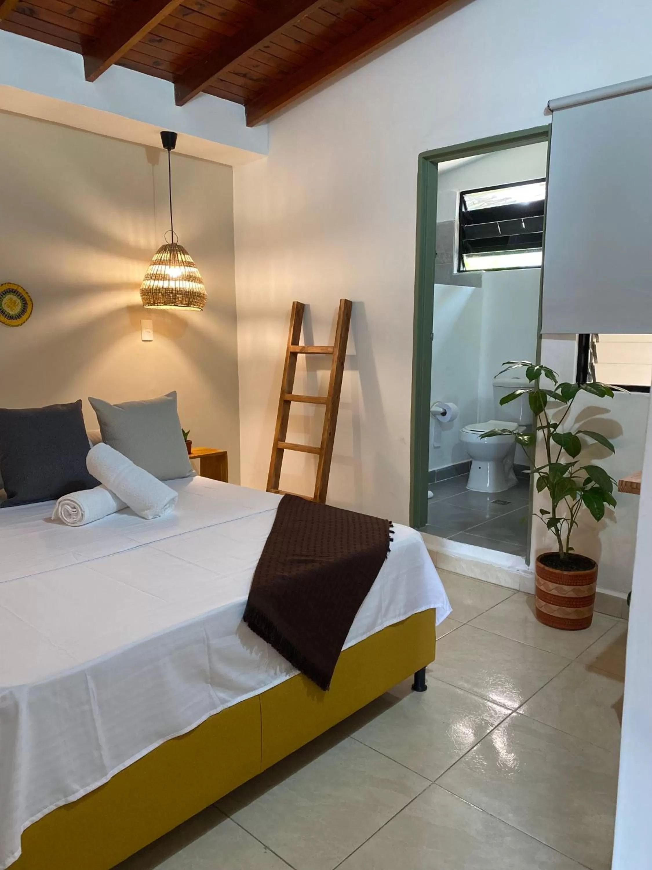 Bed in Luum Guest House