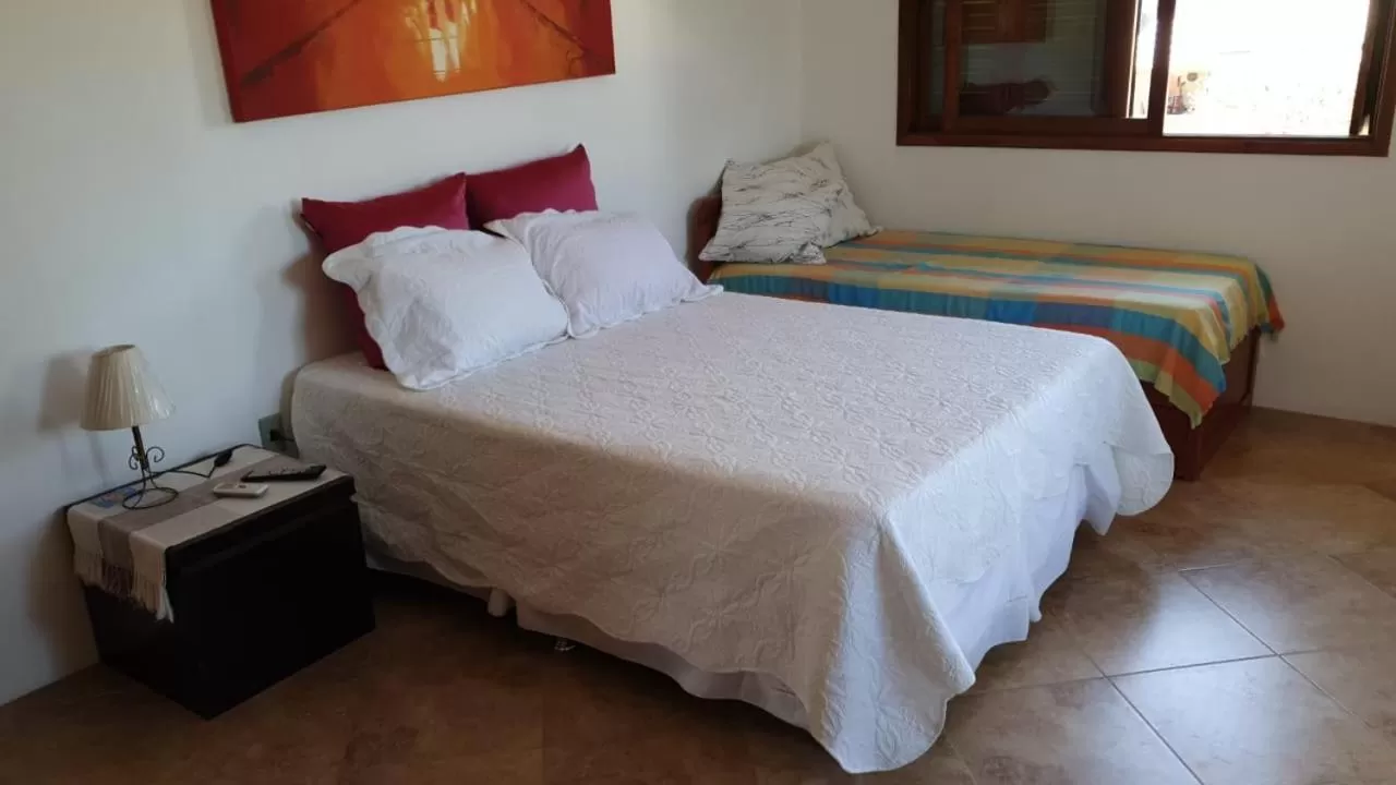Bed in Pousada Itapuã RS