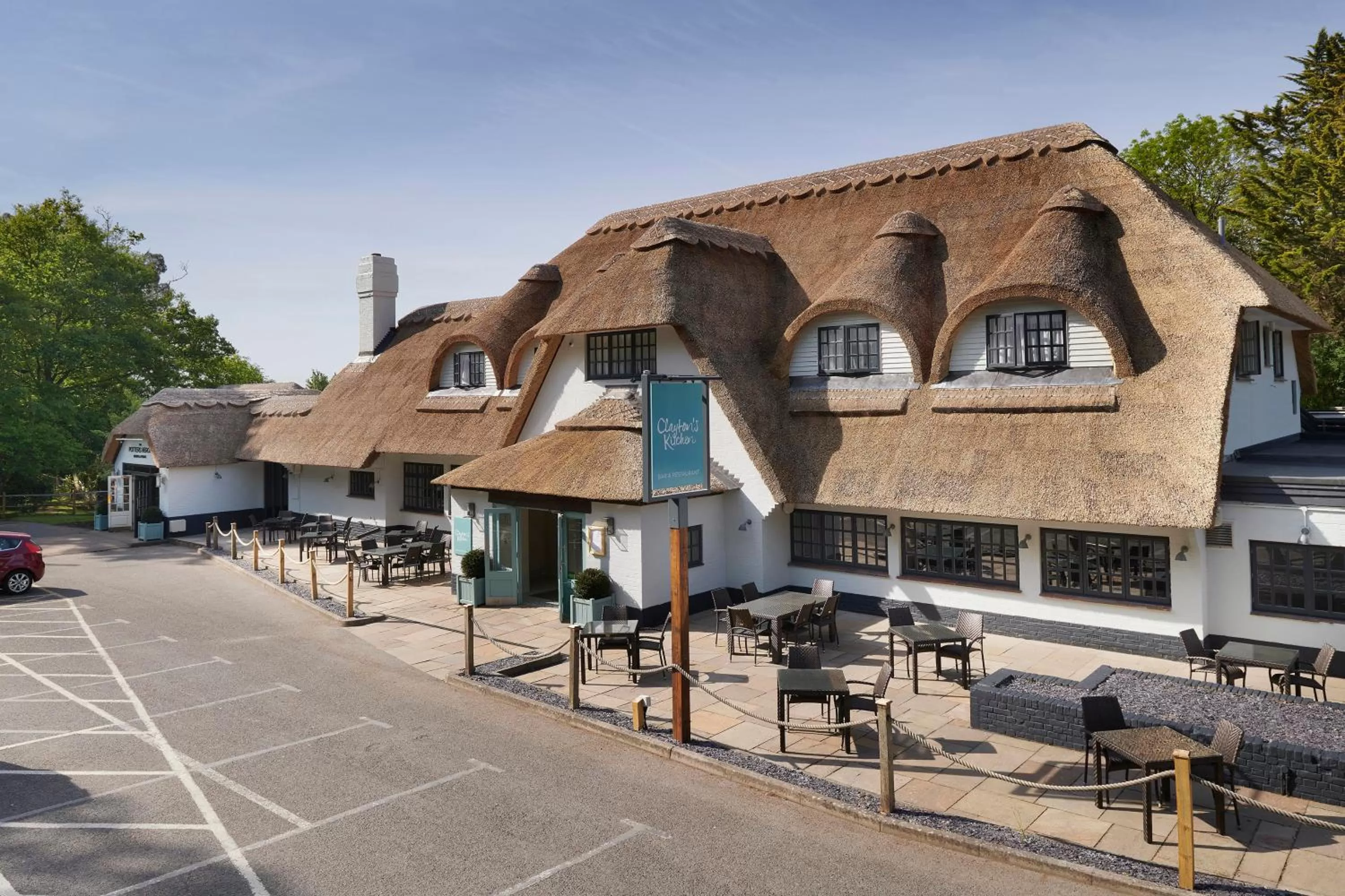 Property building in The Potters Heron - A Heartwood Inn