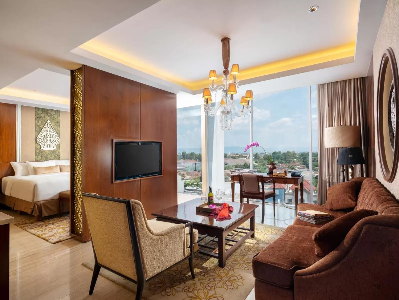 Living room, Bed in ARTOTEL Suites Bianti Yogyakarta, CHSE Certified