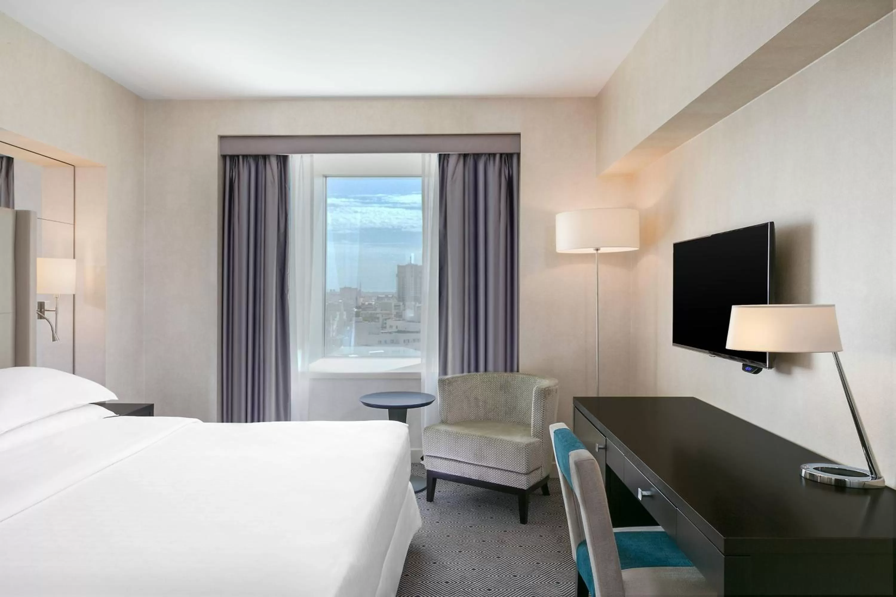 Photo of the whole room, Bed in Sheraton Bucharest Hotel