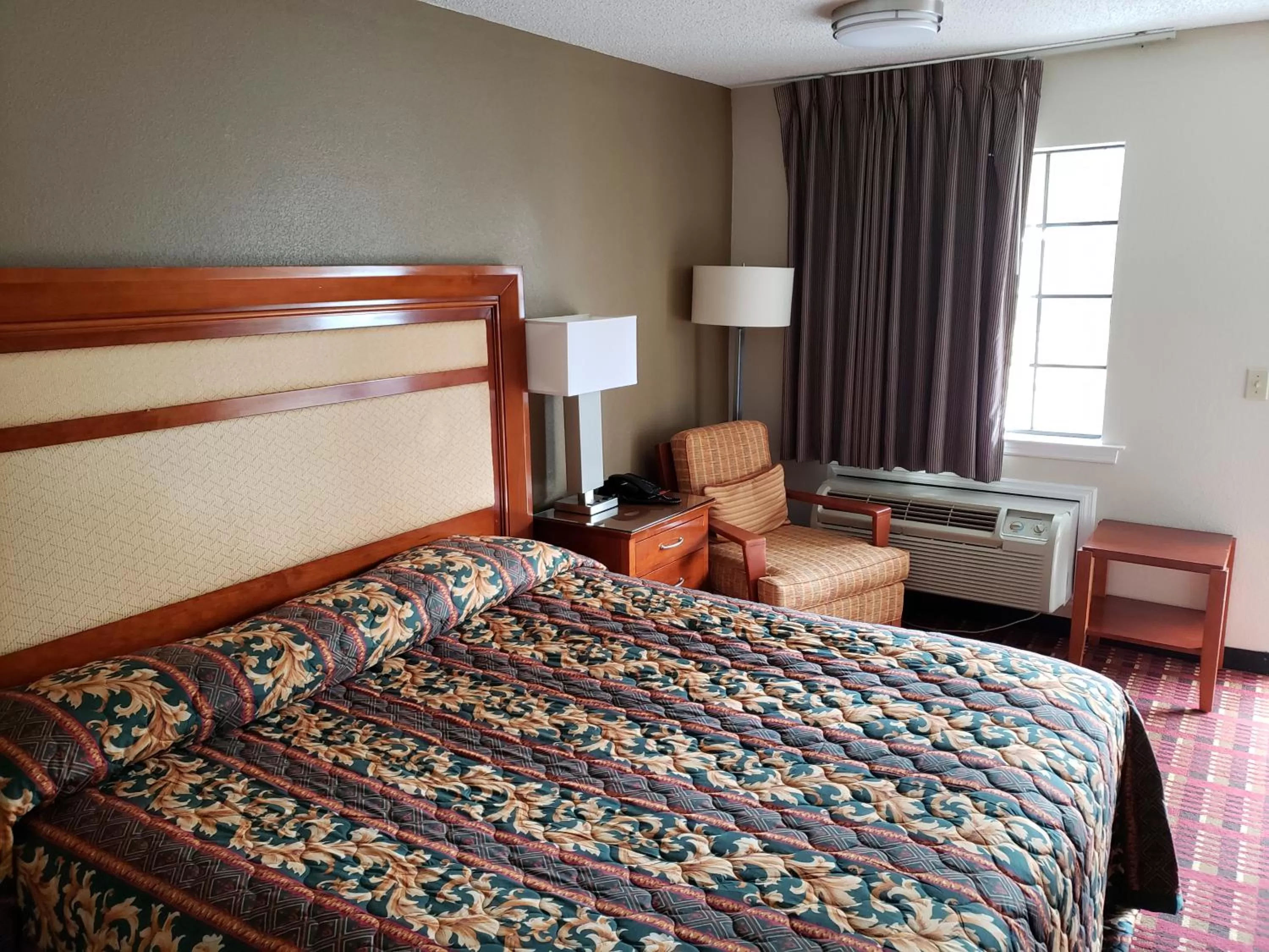 Bed in Peach Tree Inn