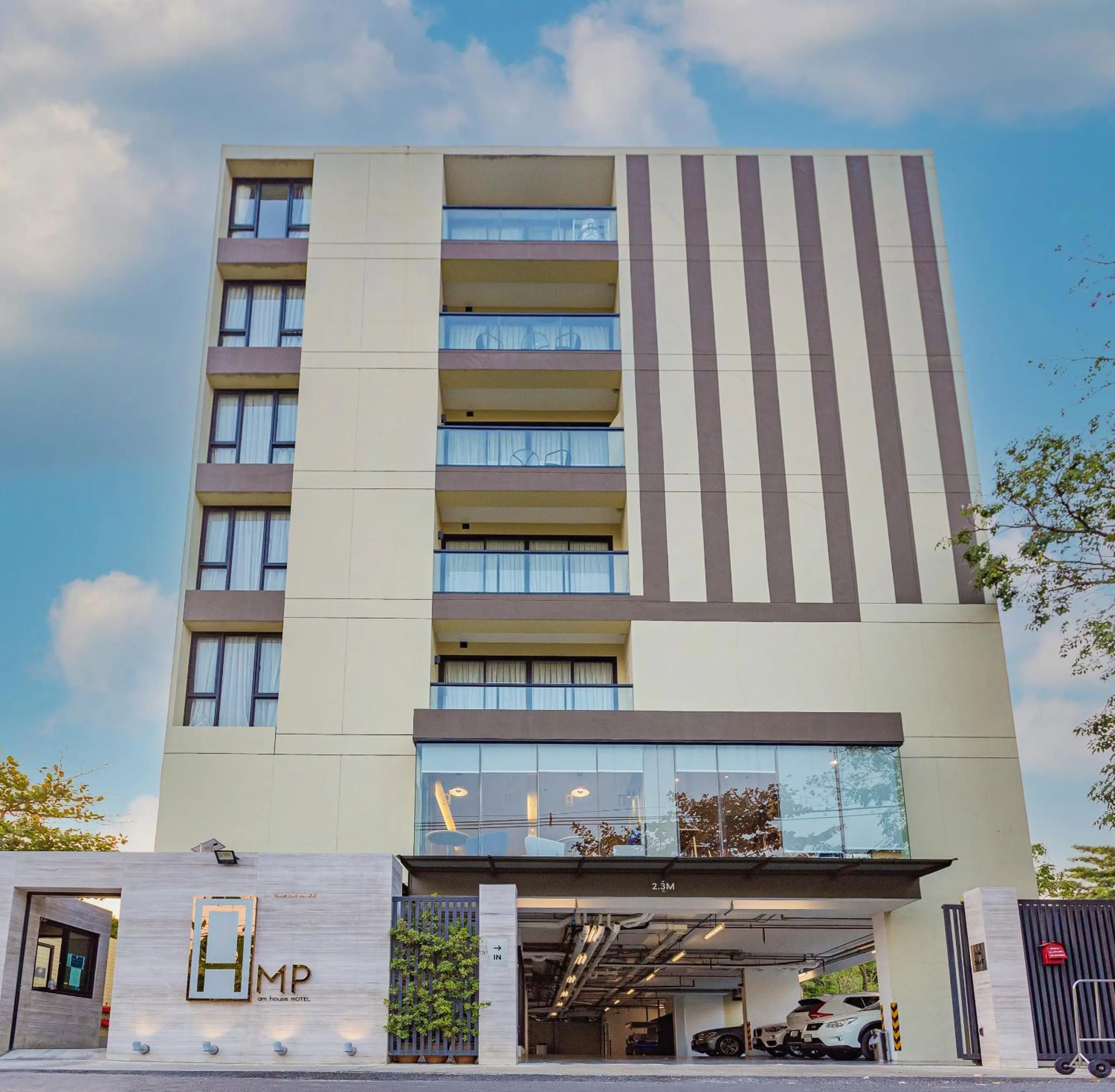 Property building in Amp Am House Bangkok Hotel