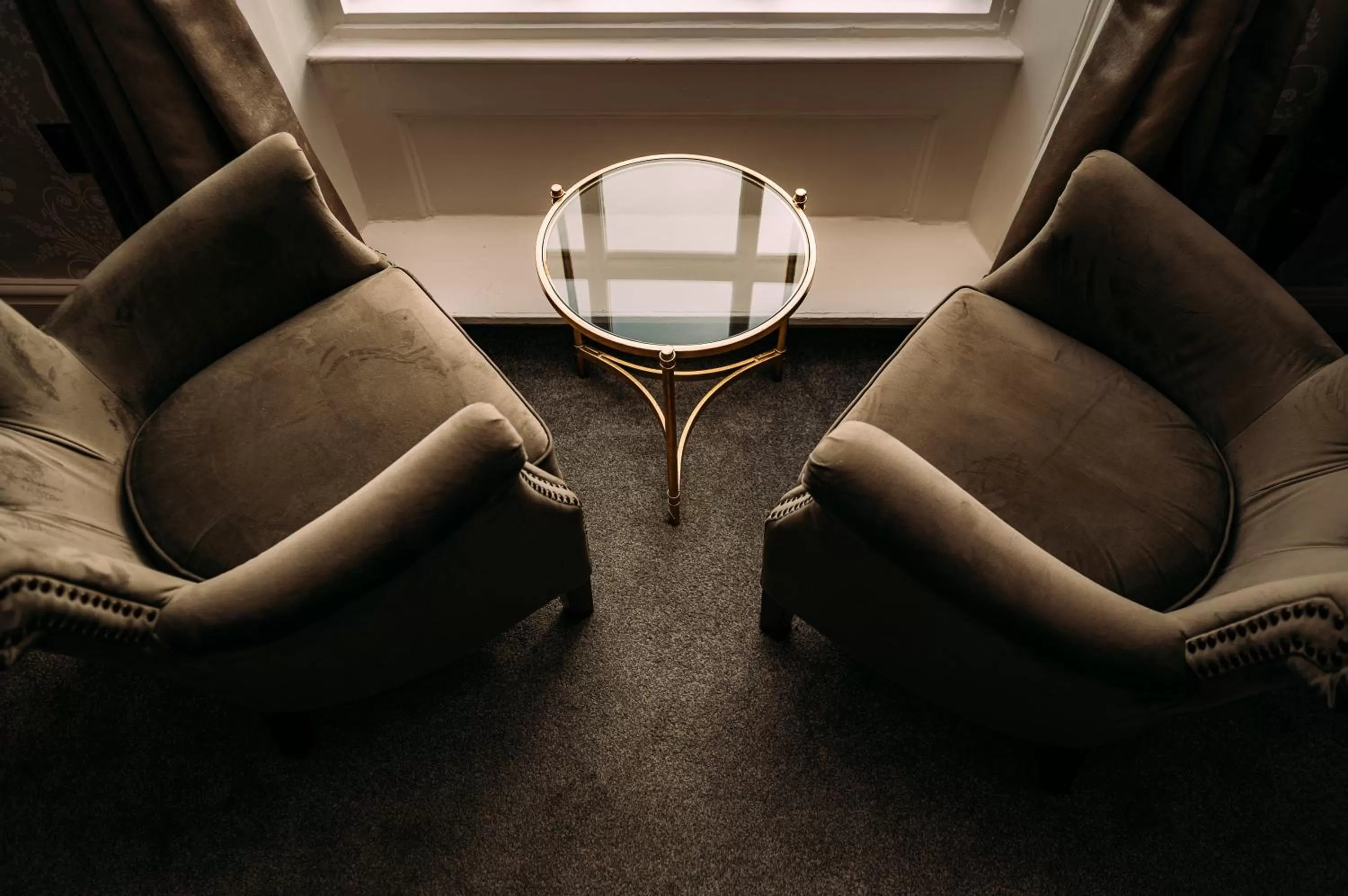 Seating area in The Queens Hotel