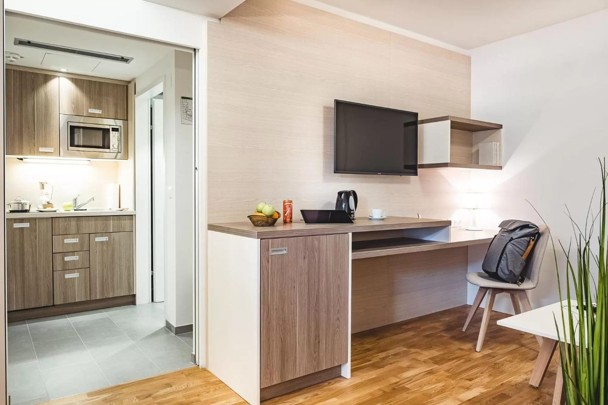 Kitchen or kitchenette in Oliver Apartments | contactless check-in