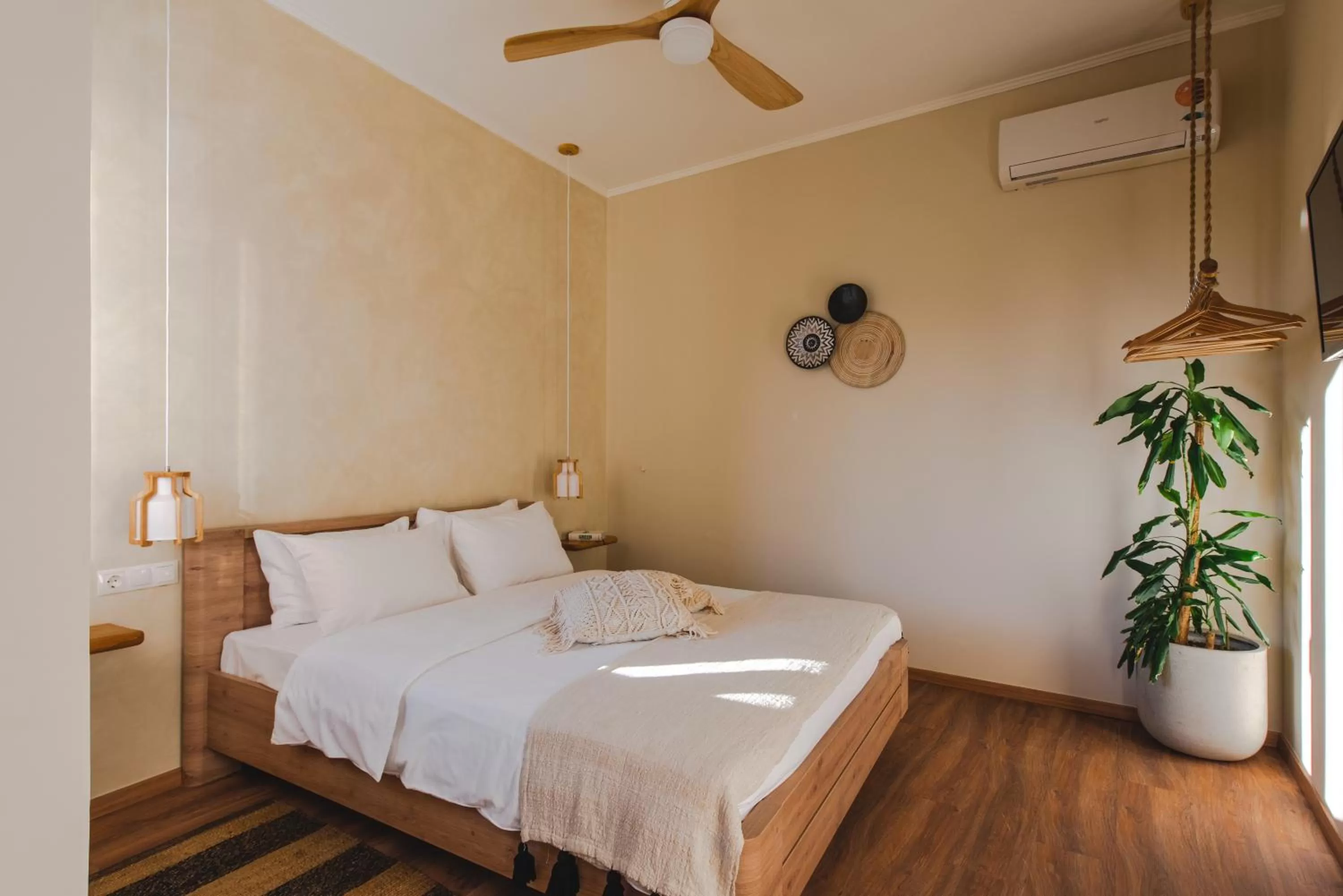 Bed in Living Stone Aparthotel