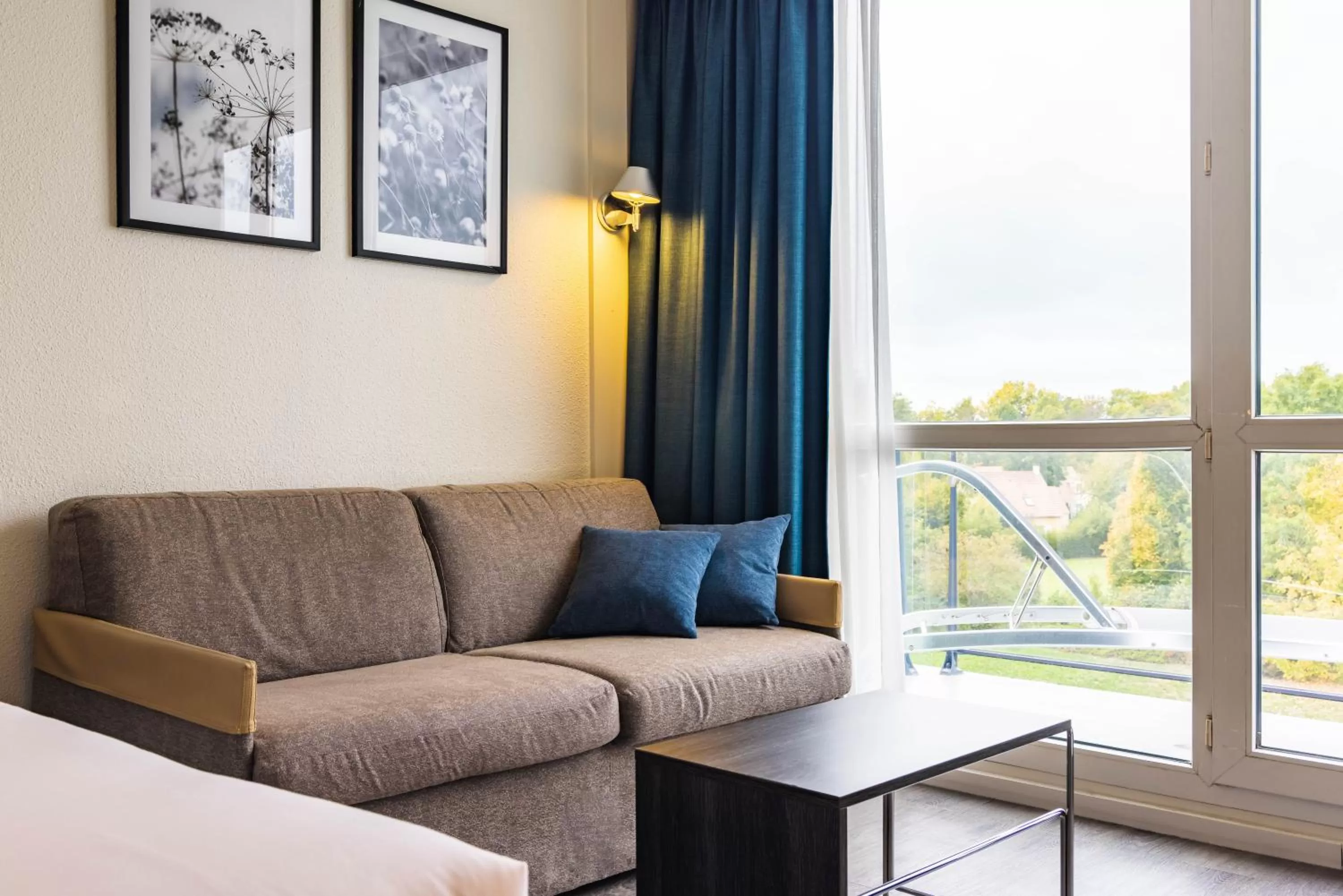 Bedroom in Novotel Senart Golf De Greenparc