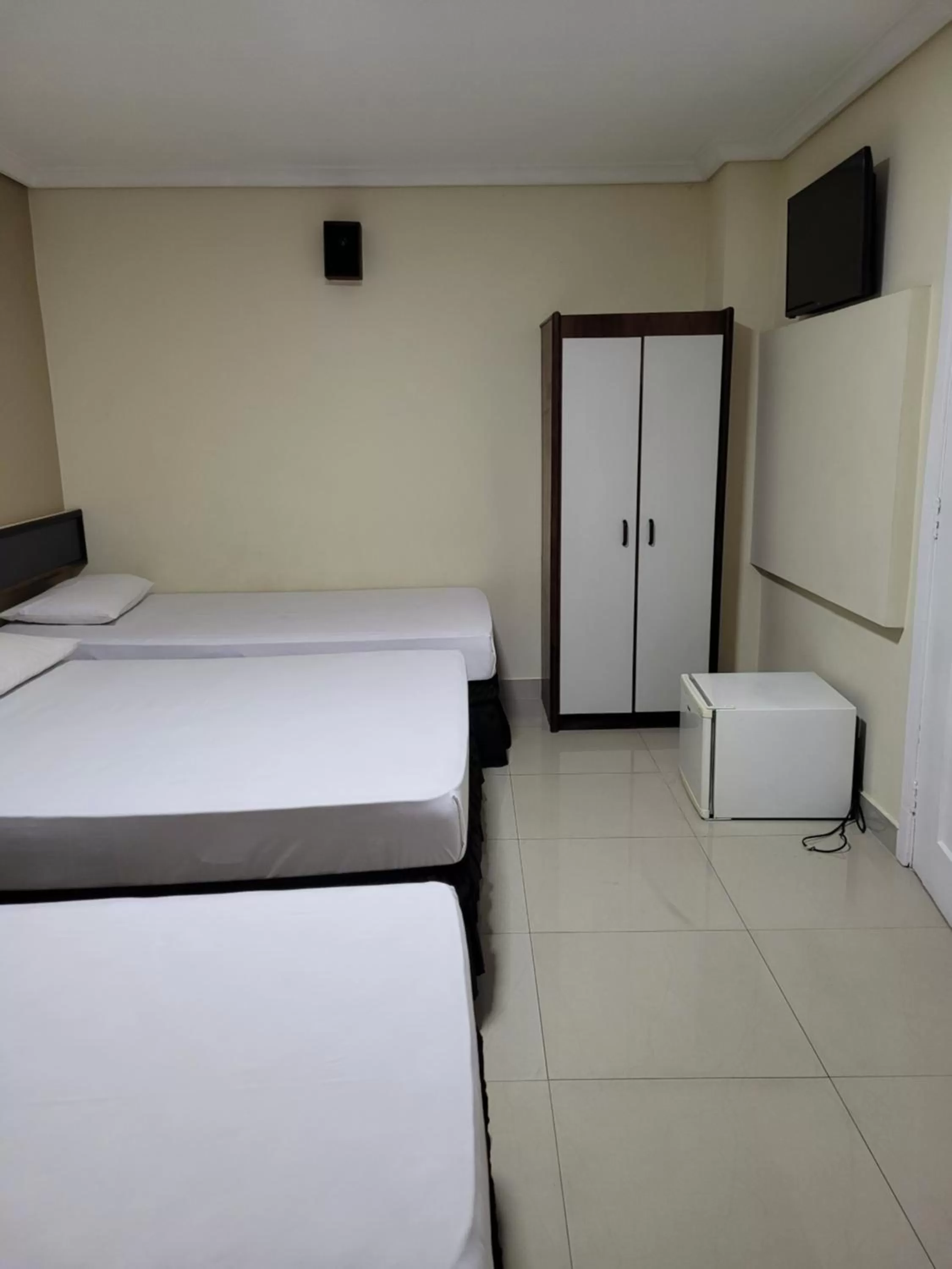 Bed in Hotel Estação Express