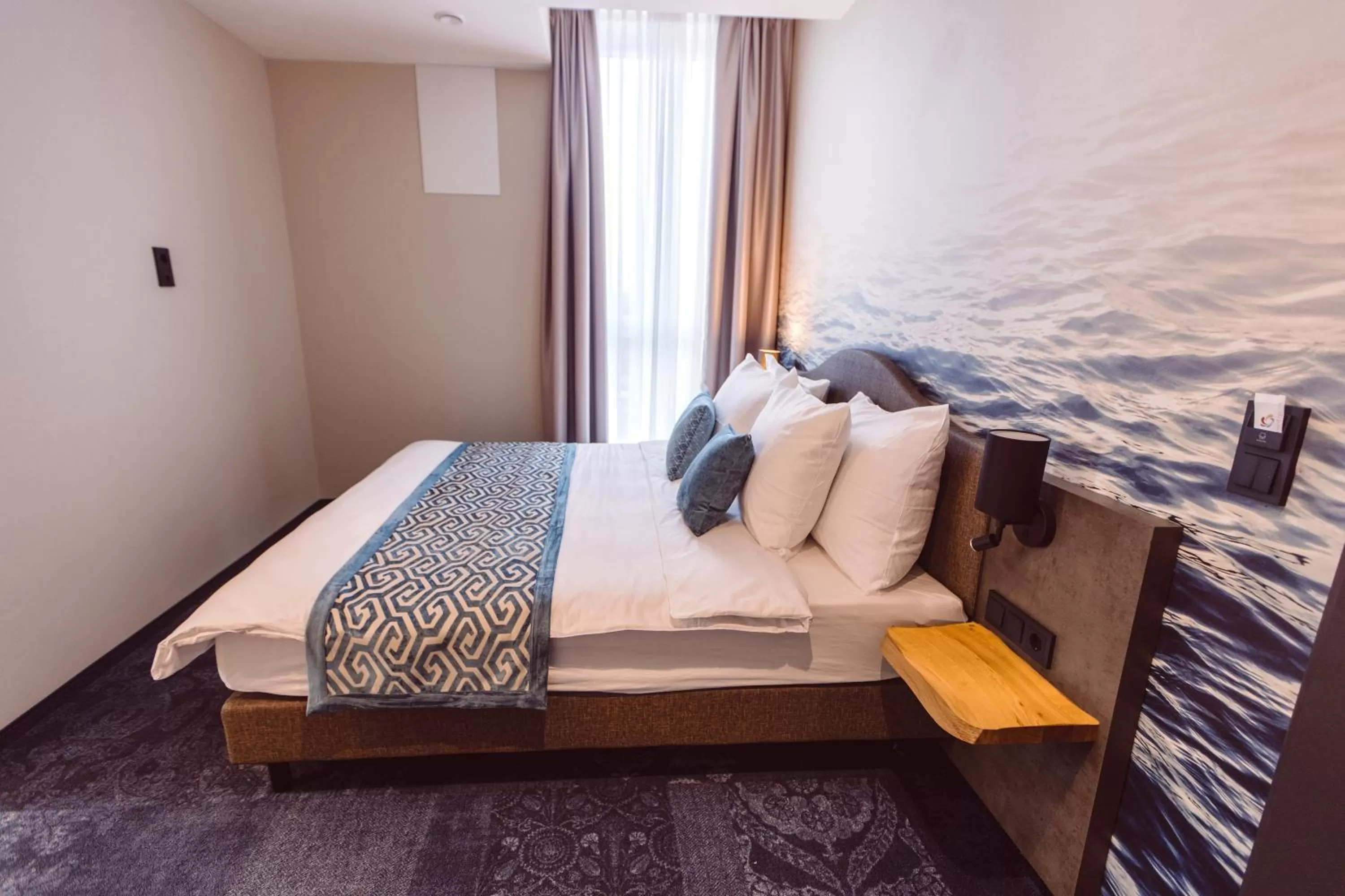 Bed in Hotel Libertas elements pure