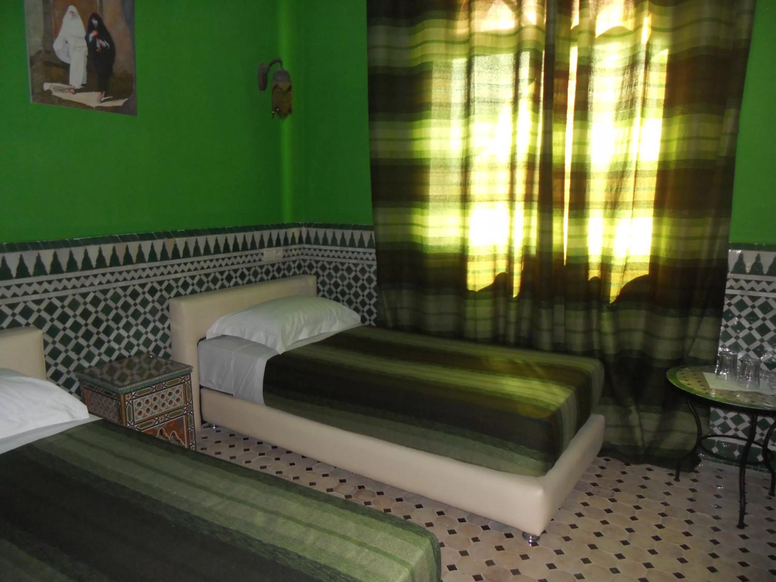Bed in Riad Passiflora